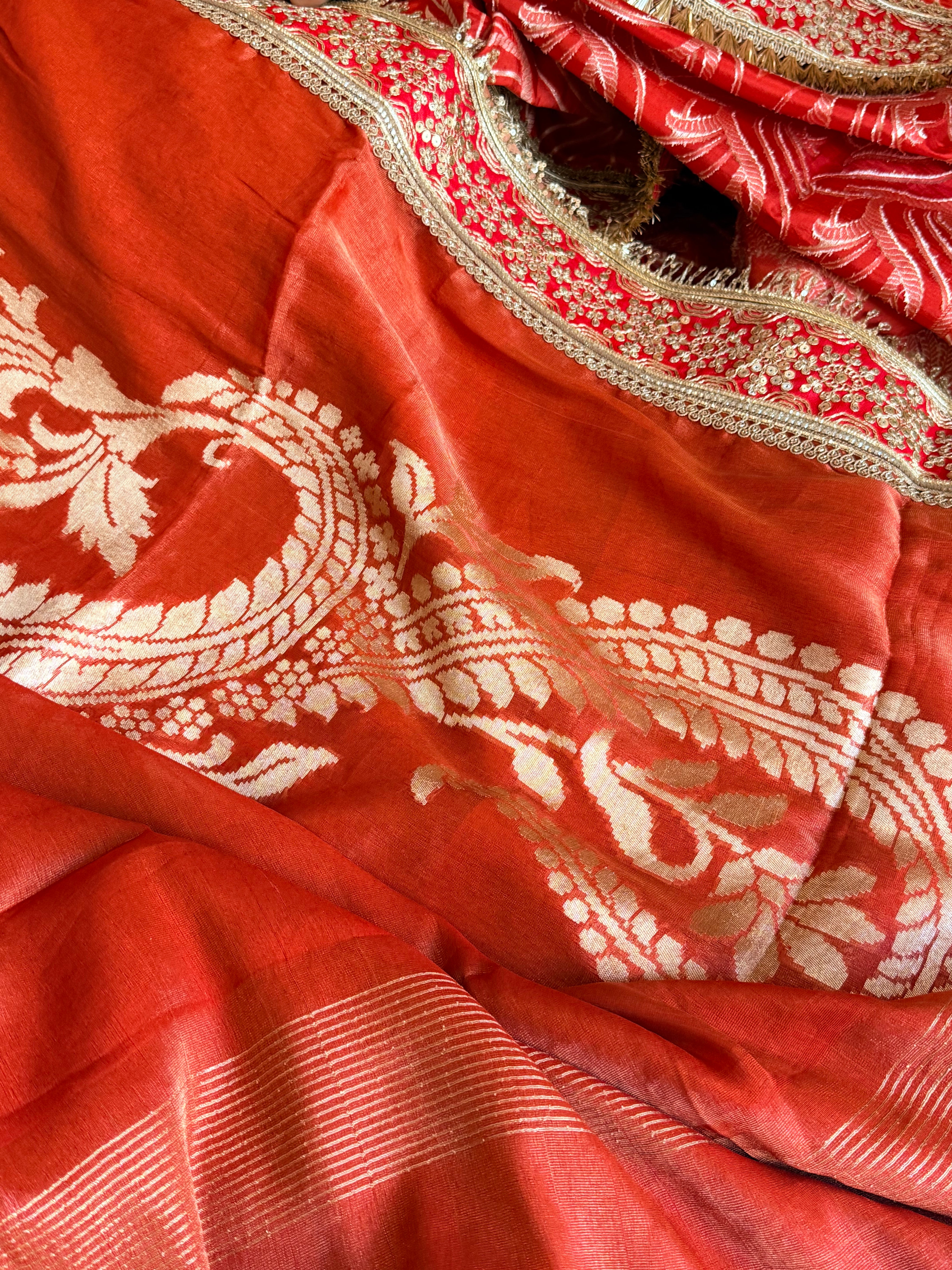 Rustic orange tissue gorgette kadhwa motif saree