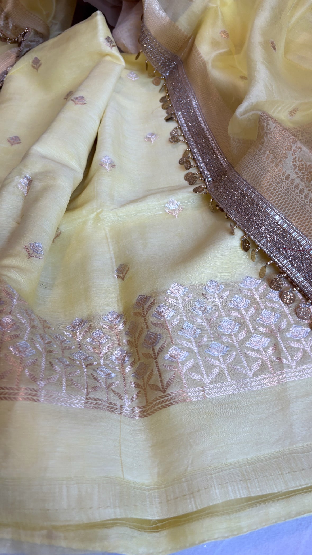 Soft lime linen gorgette kurta paired with kora silk hand woven duppata sets