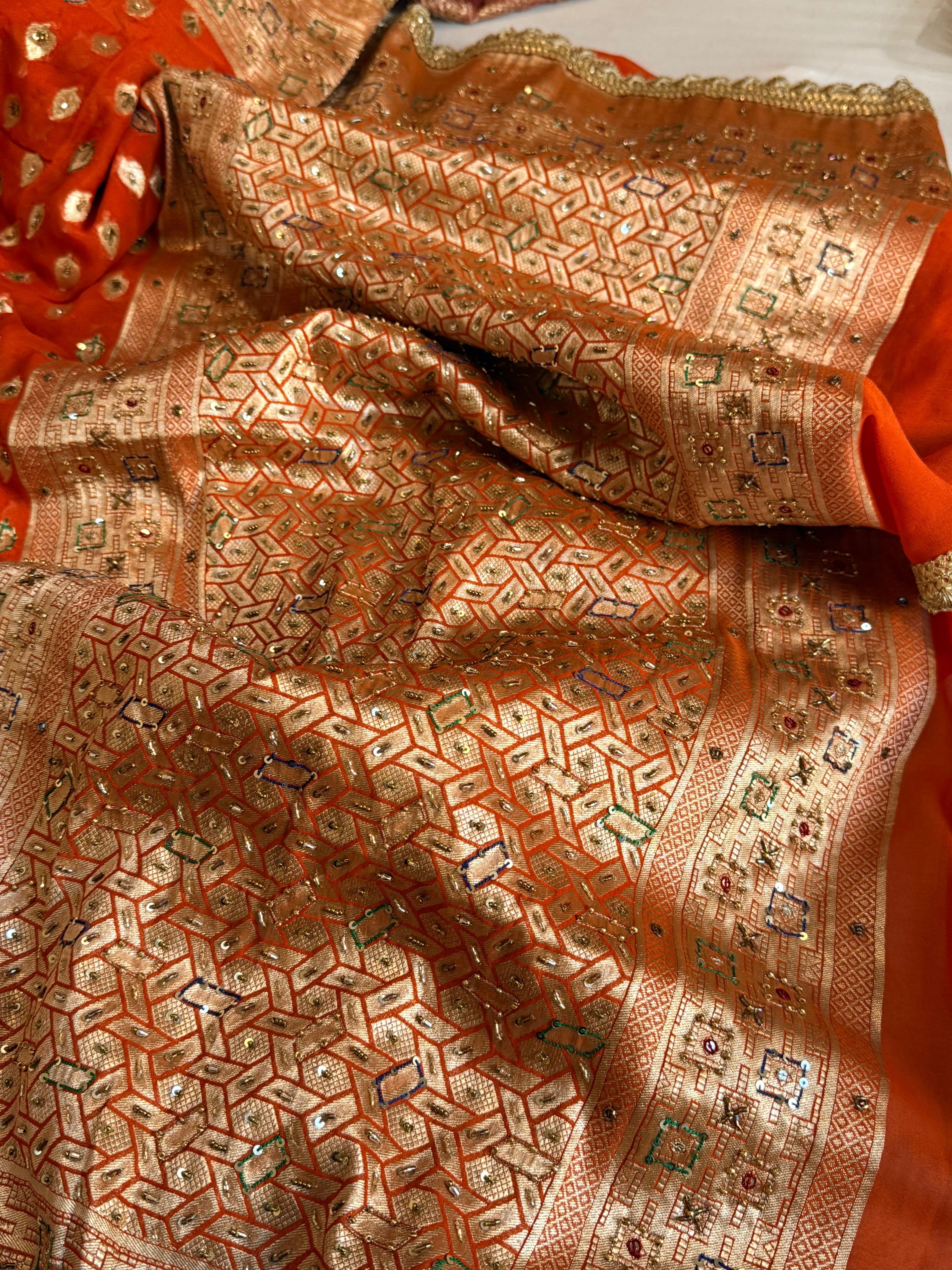 Banarasi moonga gorgette fanta orange hand embroidered kadhwa saree