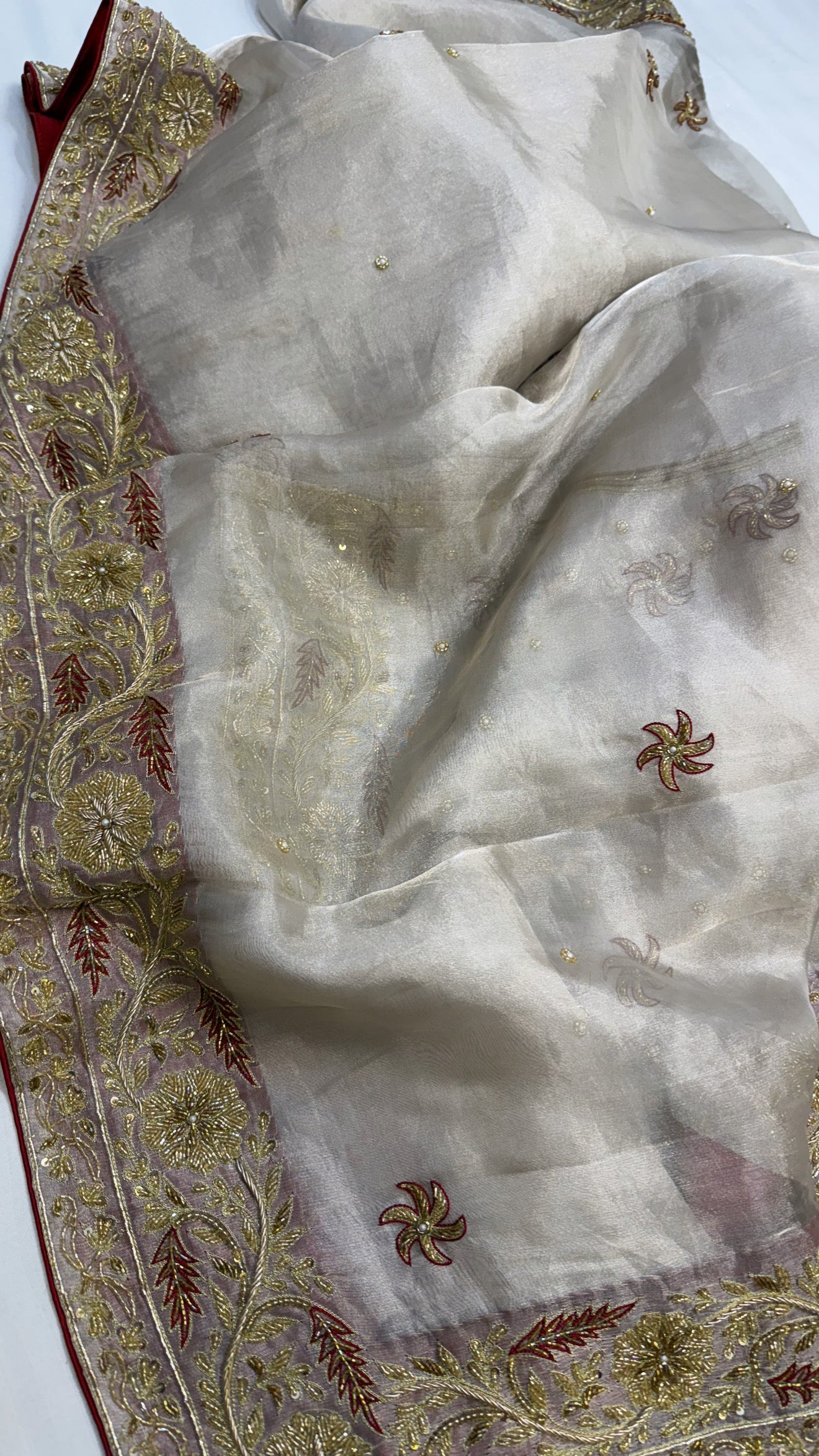 Gulab ki pankhuri husn tissue silk heavy hand embroidered zardozi border saree