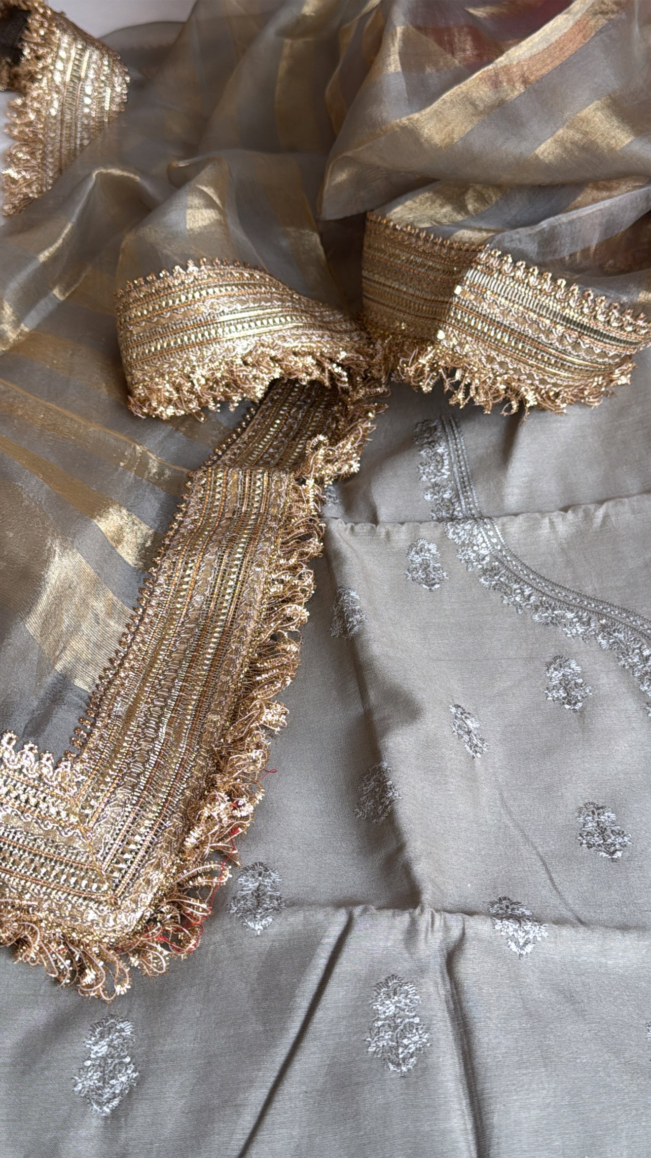 Banarasi cotton silk hand embroidered kurta paired with kora tissue striped duppata set
