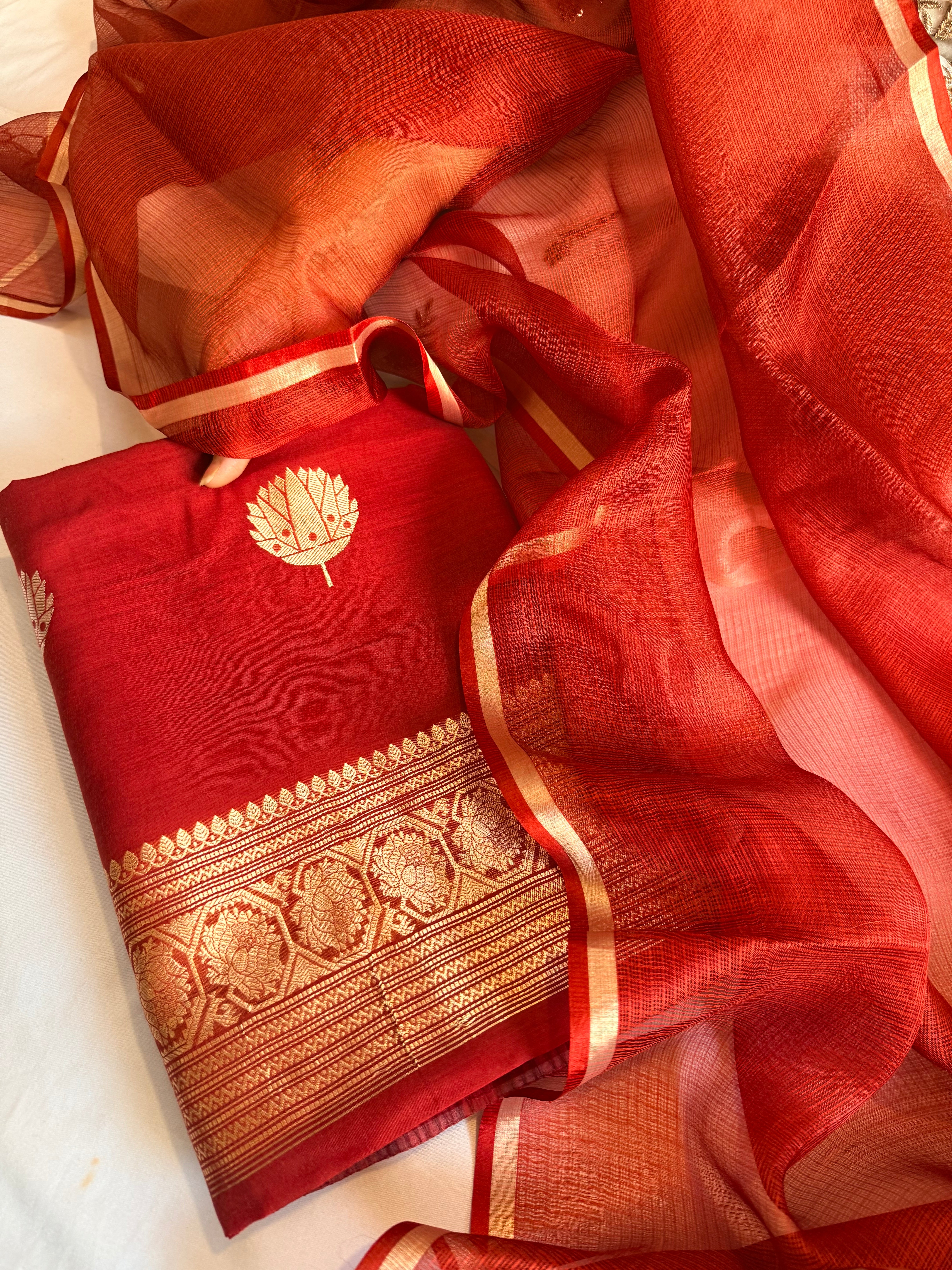 Blood red mul cotton kadhwa buti kurta paired with kora silk net duppata set
