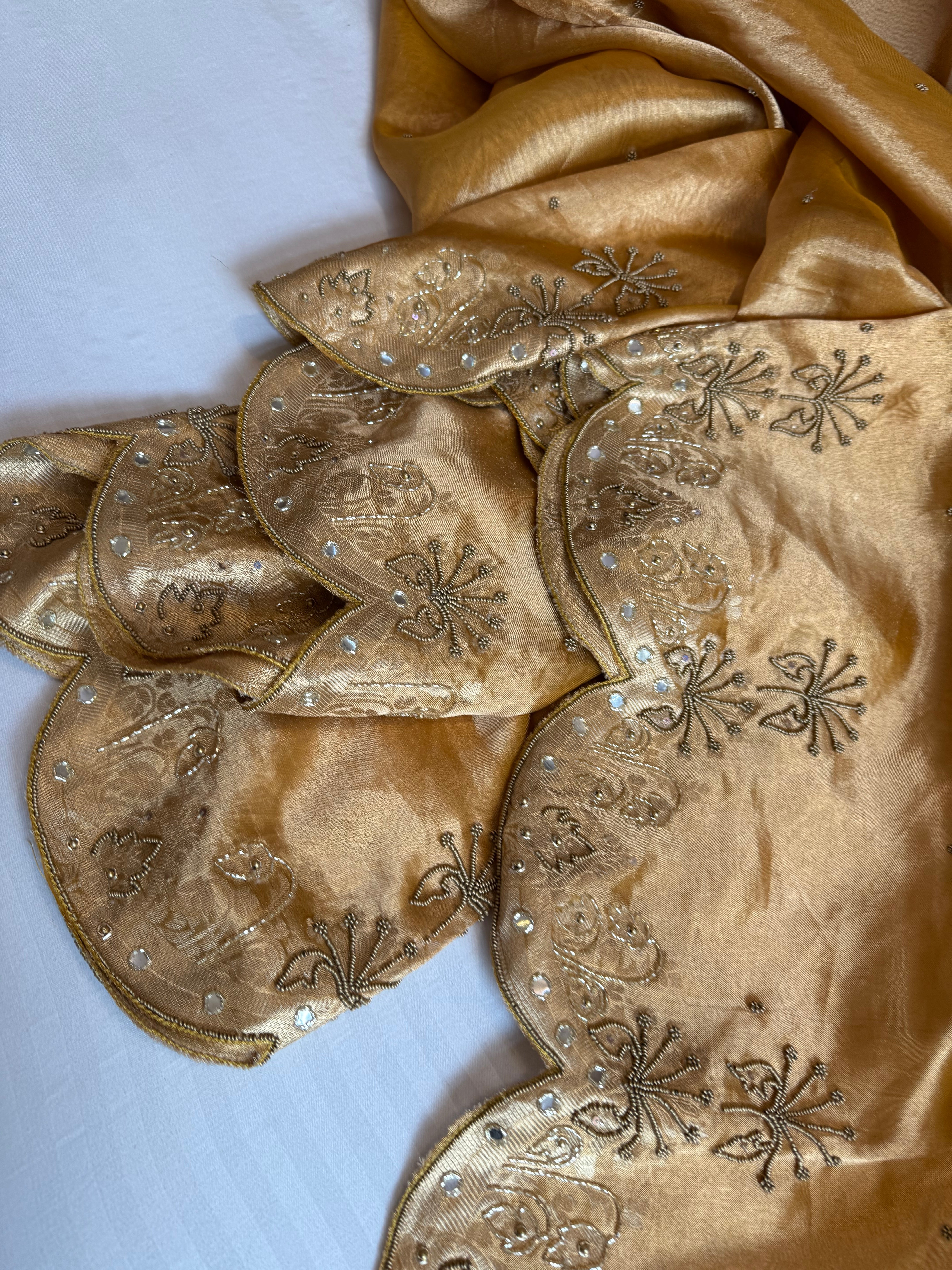 Husn kanjivaram gold tissue silk heavy hand embroidered saree