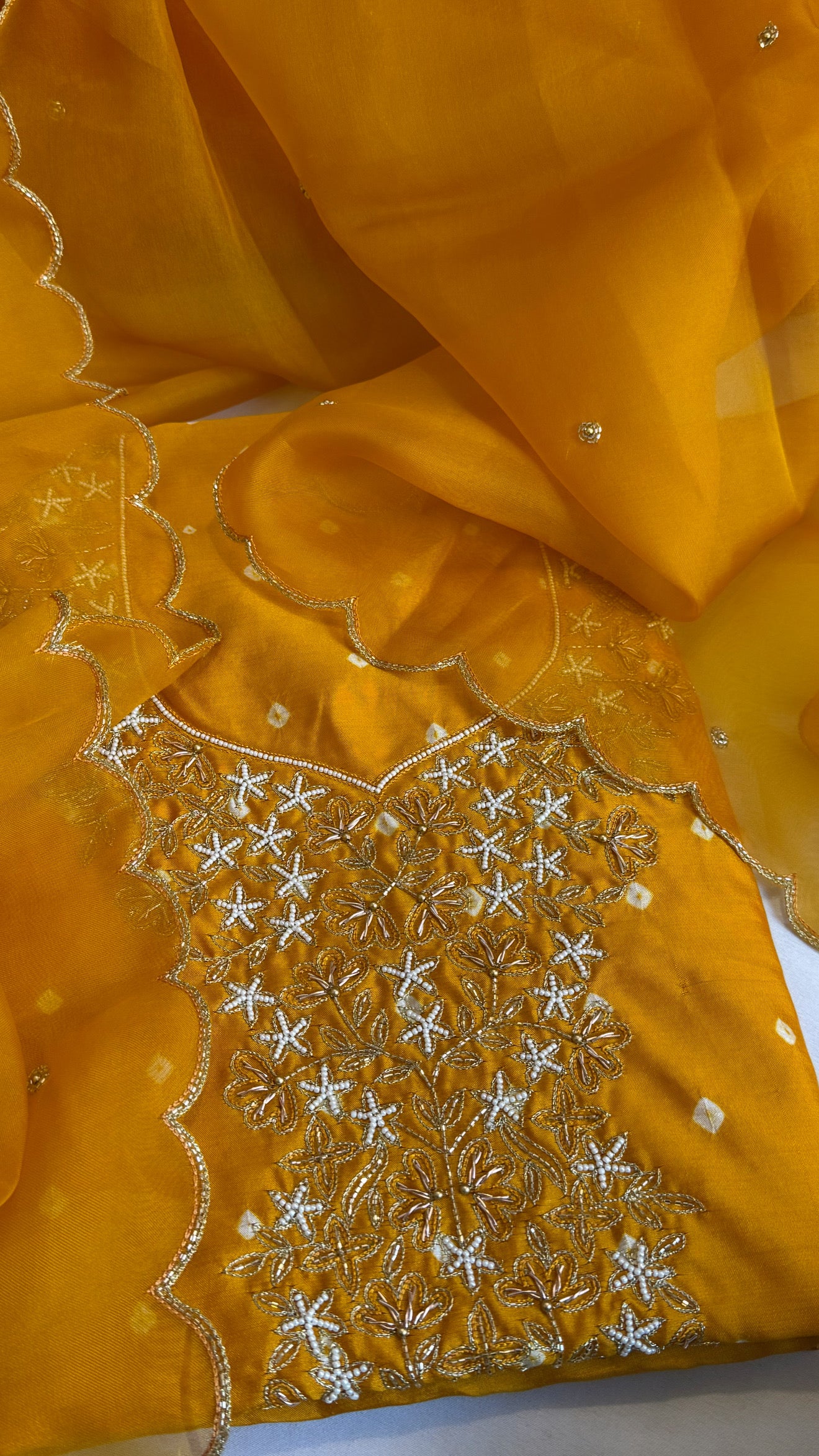 Haldi yellow raw mango bandhej hand embroidered kadhwa suit set