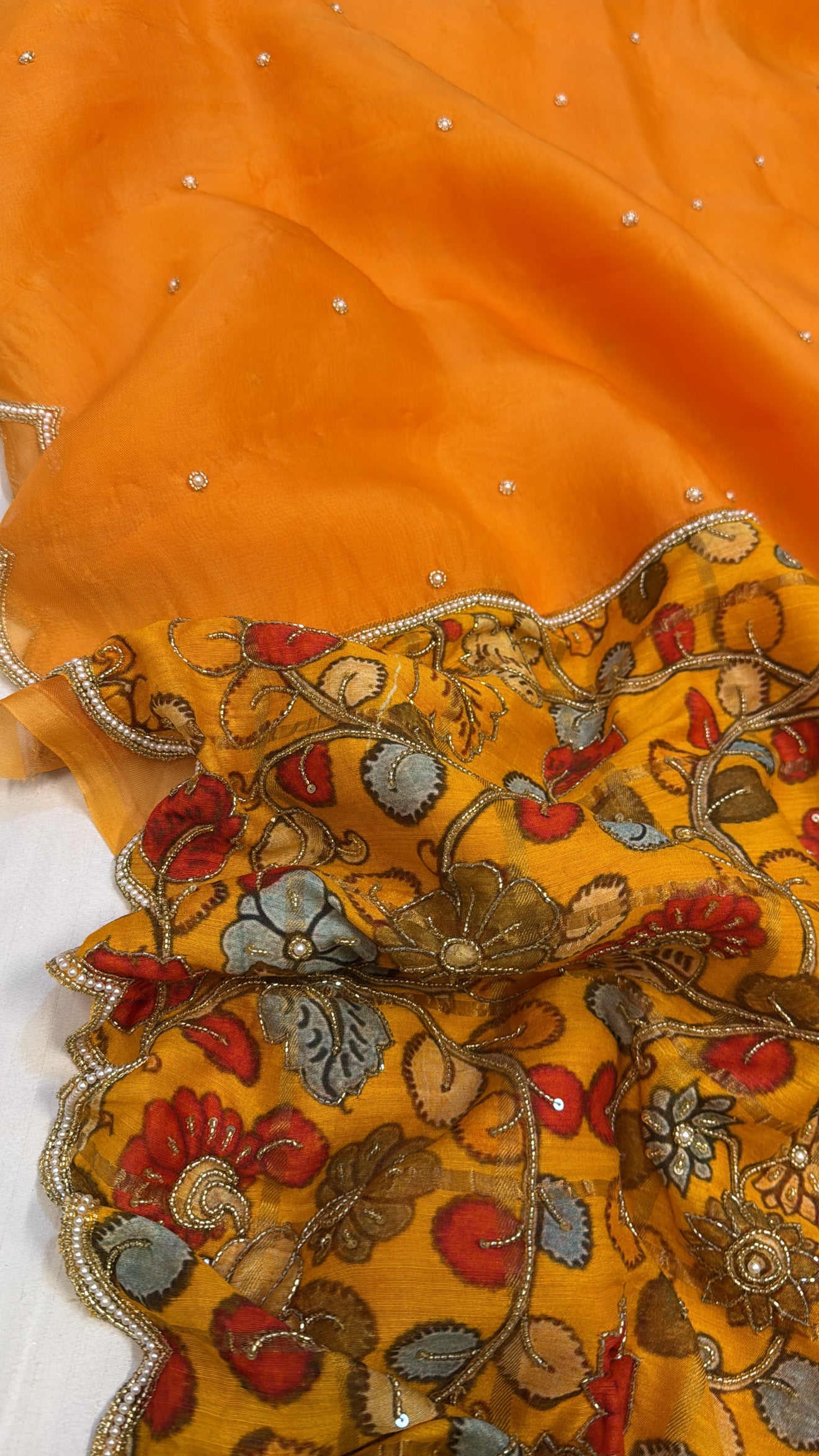 Turmeric yellow kora silk patched printed pallu kadhwa scalloped saree