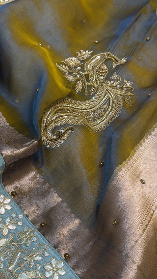 Husn dusty metallic blue tissue silk hand embroidered saree