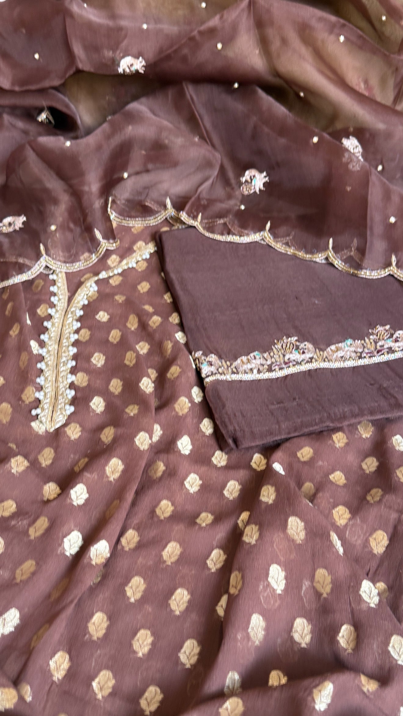 Choco brown banarasi gorgette kadhwa buti kurta paired with toy hathi motif hand embroidered scalloped kora duppata