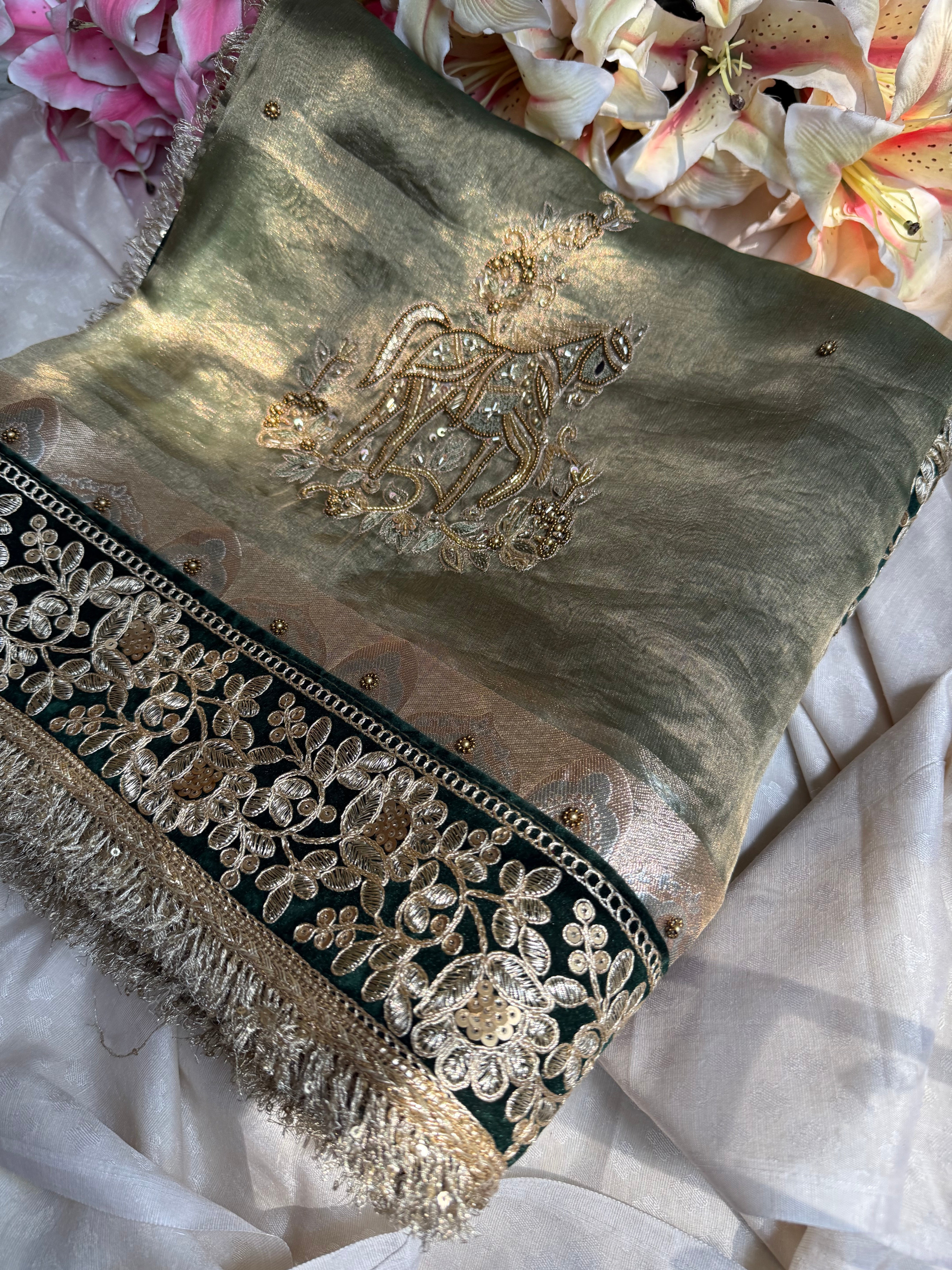 सुनहरा घोड़ा-  Royal horse motif tissue silk mint green hand embroidered saree