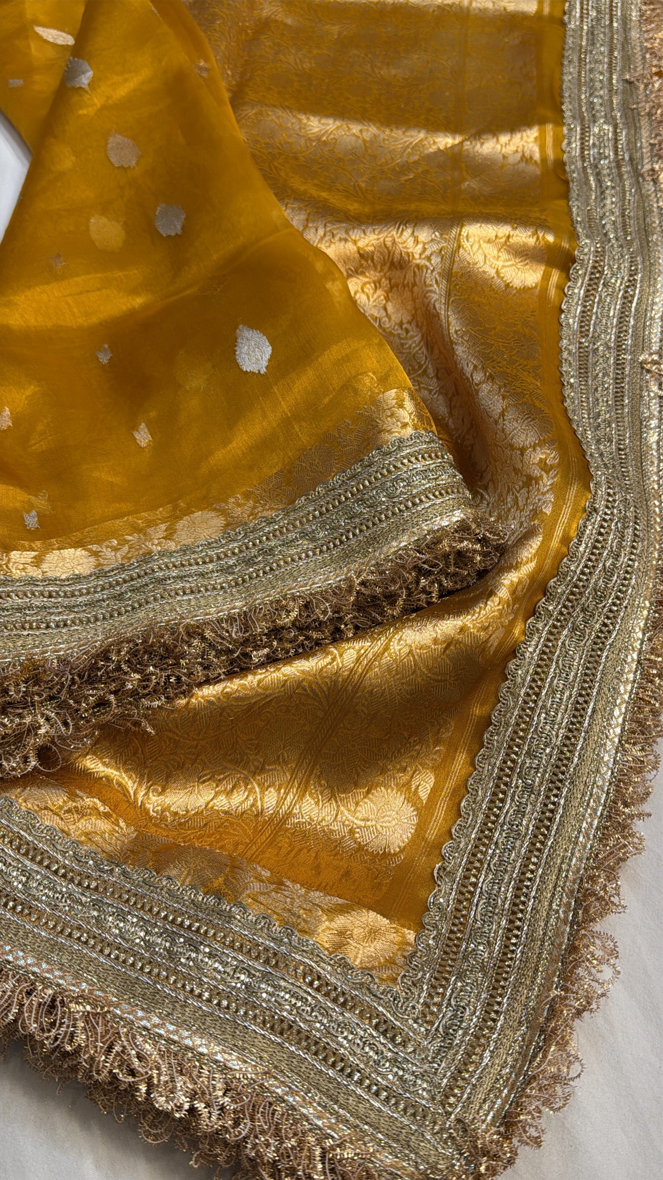 Maharani deep haldi yellow tissue silk kadhwa buti saree