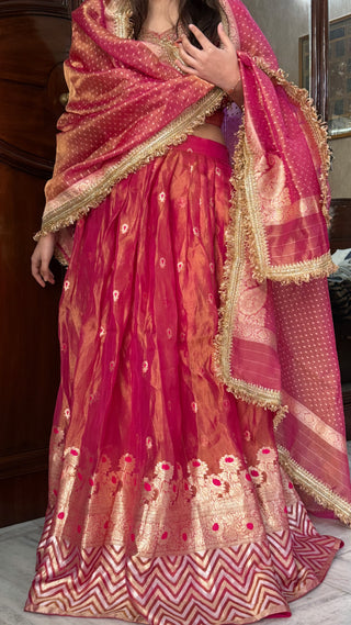 “Kali wala lahenga” — Rani pink semi stitched banarasi tissue silk lehenga set