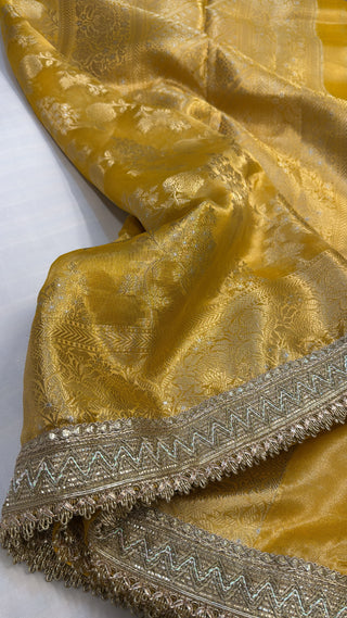 Maharani haldi yellow tissue silk jungla kadhwa saree