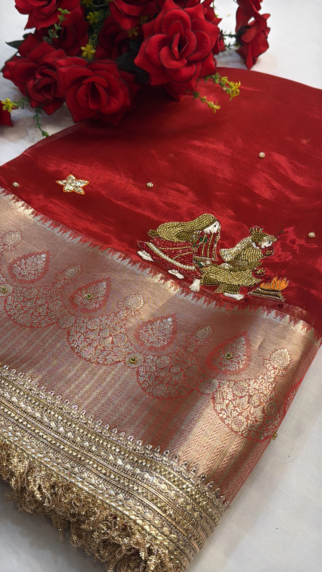 Dulhan ka joda husn red tissue silk hand embroidered saree
