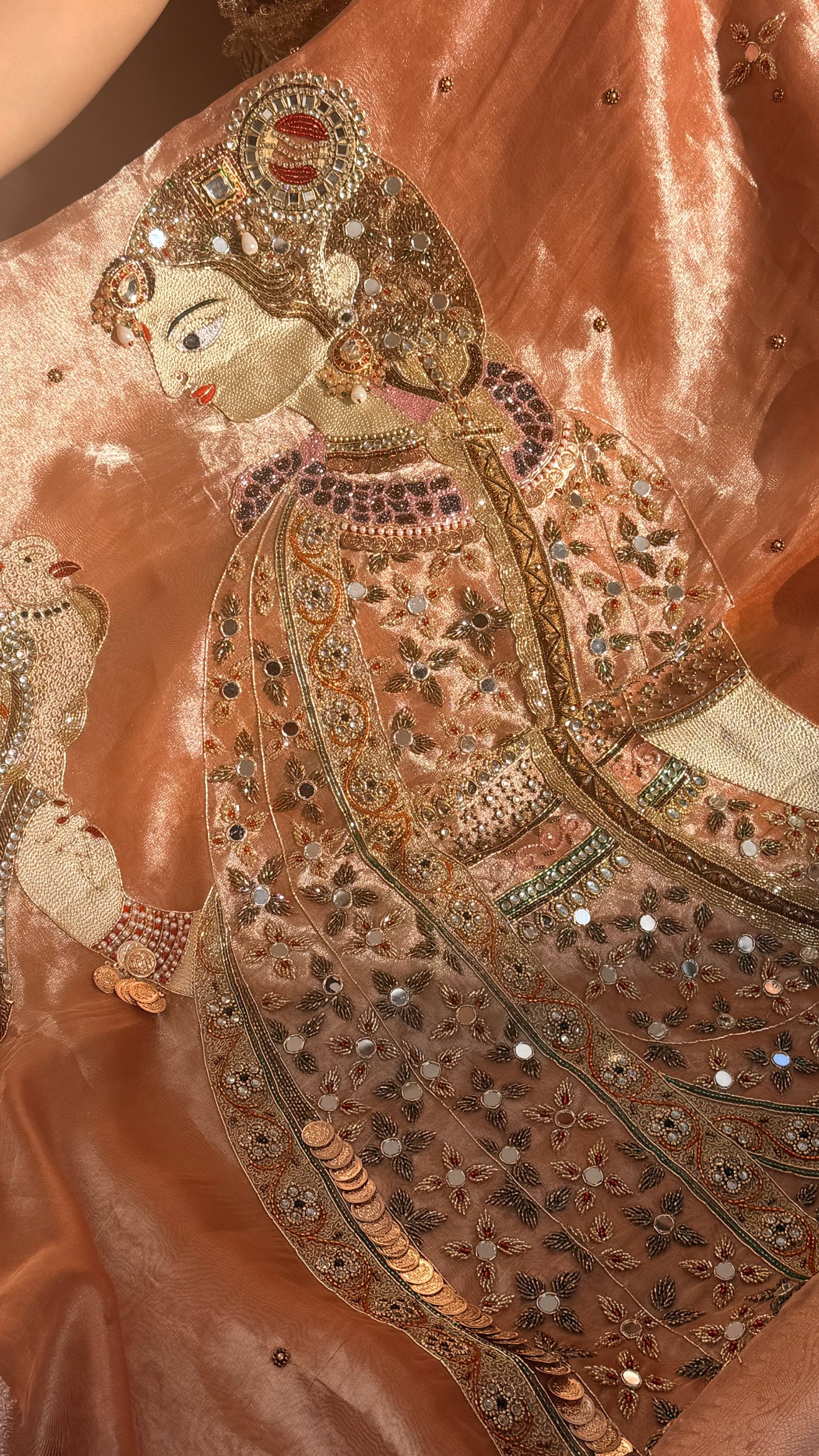 Heer saree with jadau necklace work hand embroidered tissue silk gajri peach saree