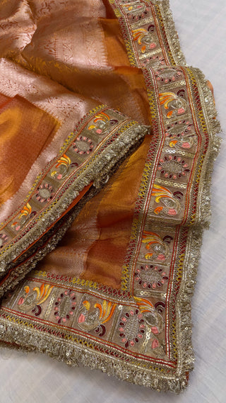 Fanta orange maharani tissue silk meenakari border saree