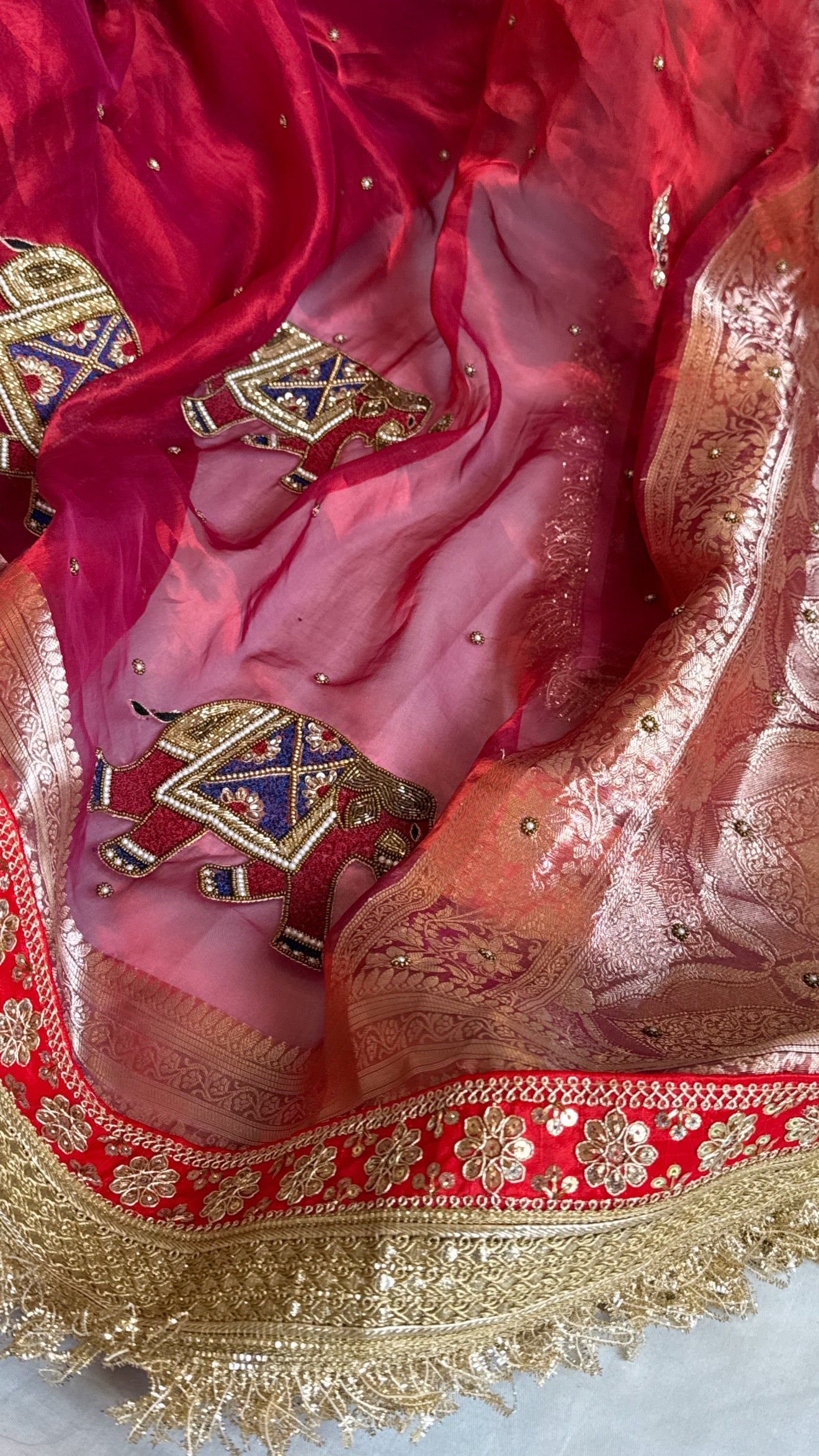 Elephant motif cranberry metallic red husn tissue silk hand embroidered saree