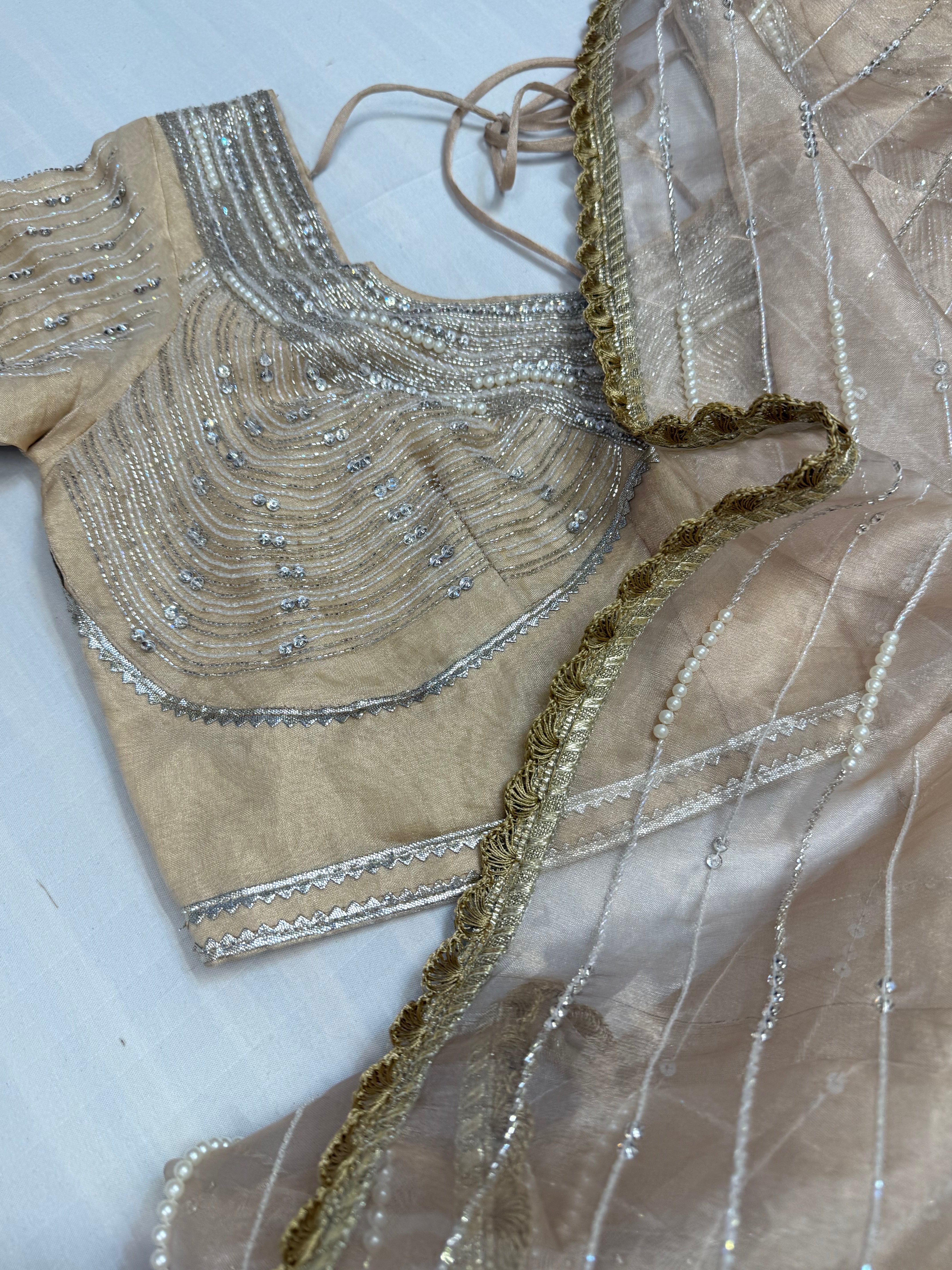 Suhana khan inspired golden pearl work heavy hand embroidered tissue silk saree