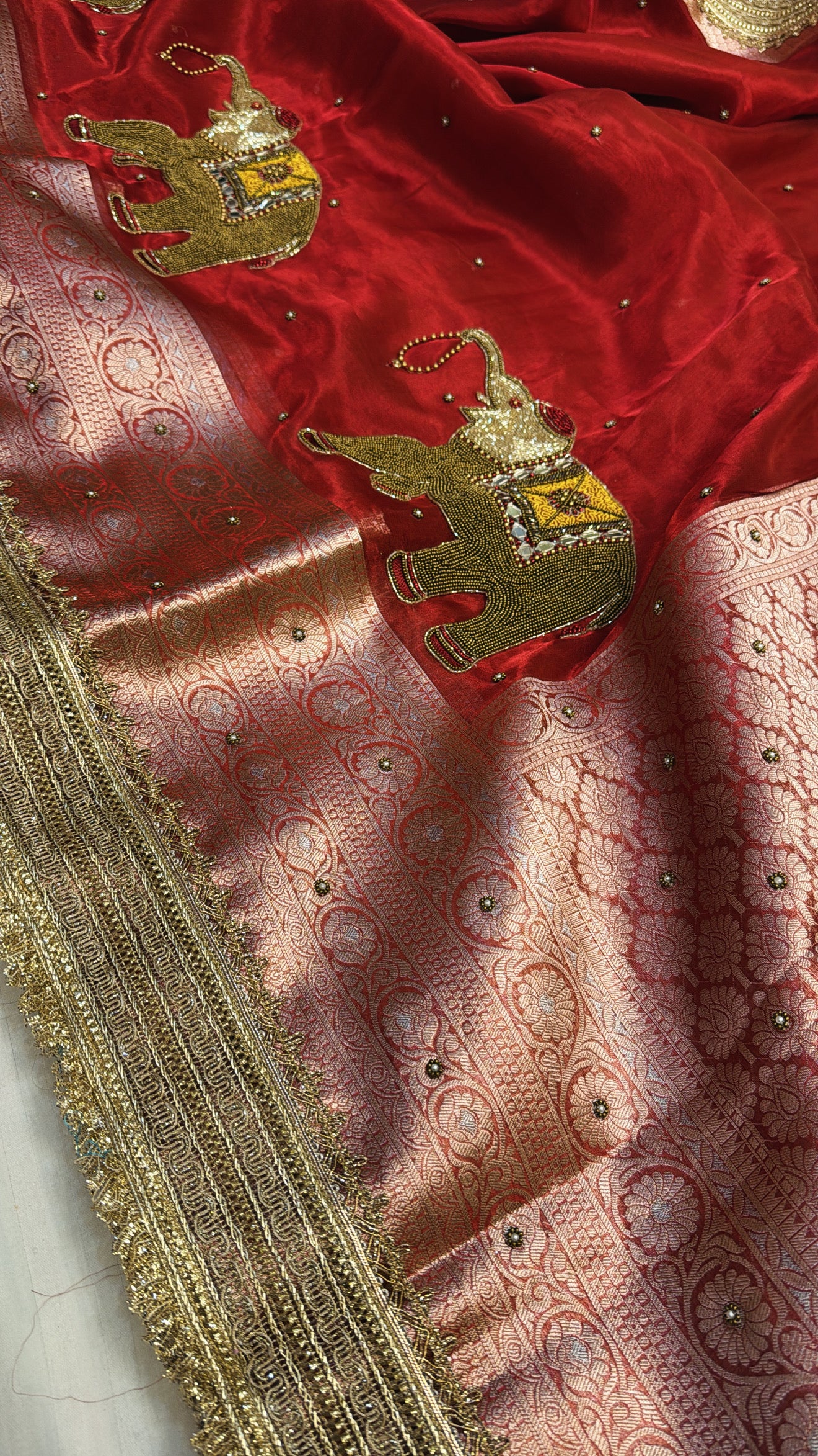 Red special - Husn hot red tissue silk elephant motif hand embroidered saree