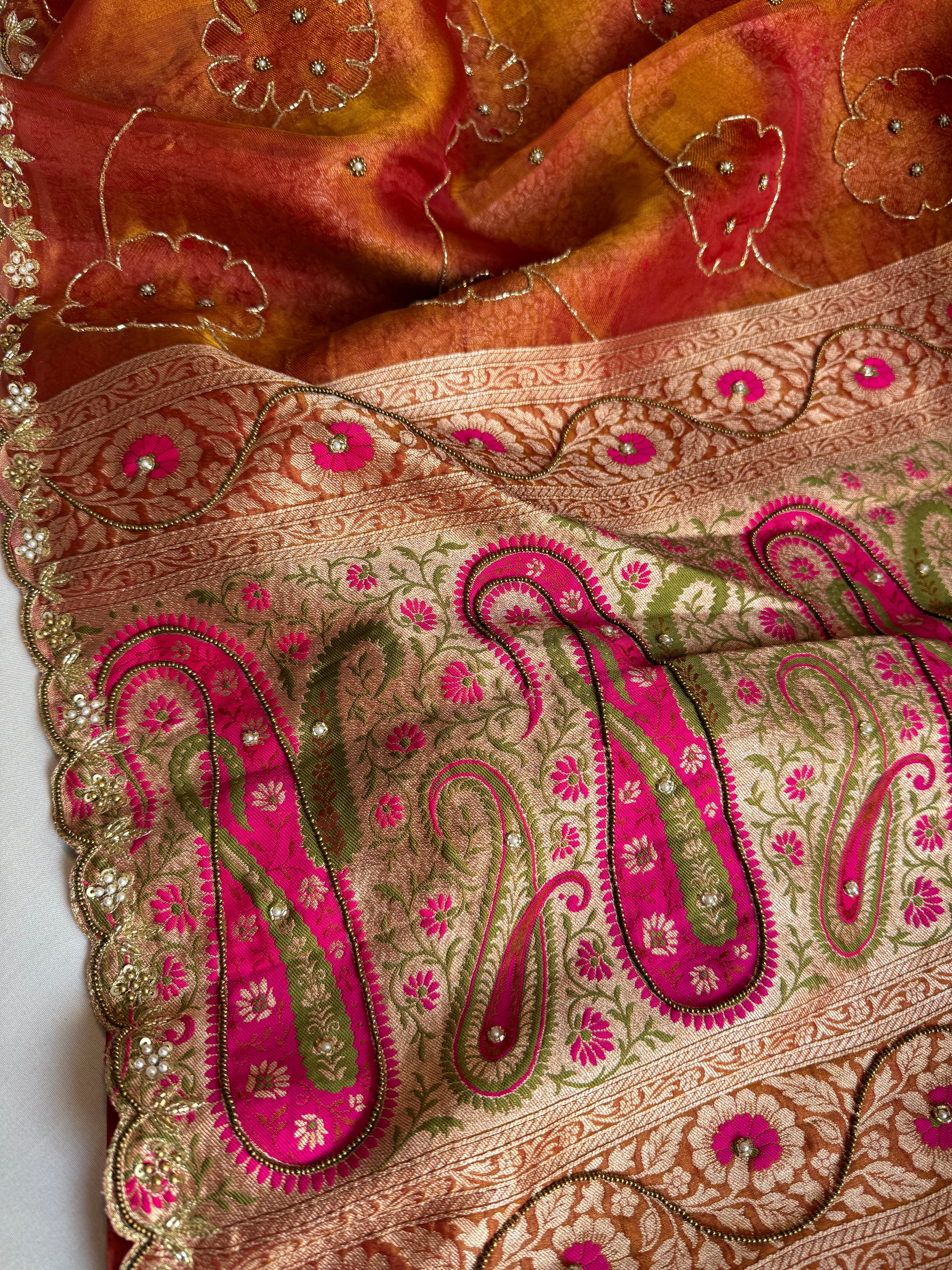 Rust orange tissue tanchoi jamevar pallu meenakari work hand embroidered saree