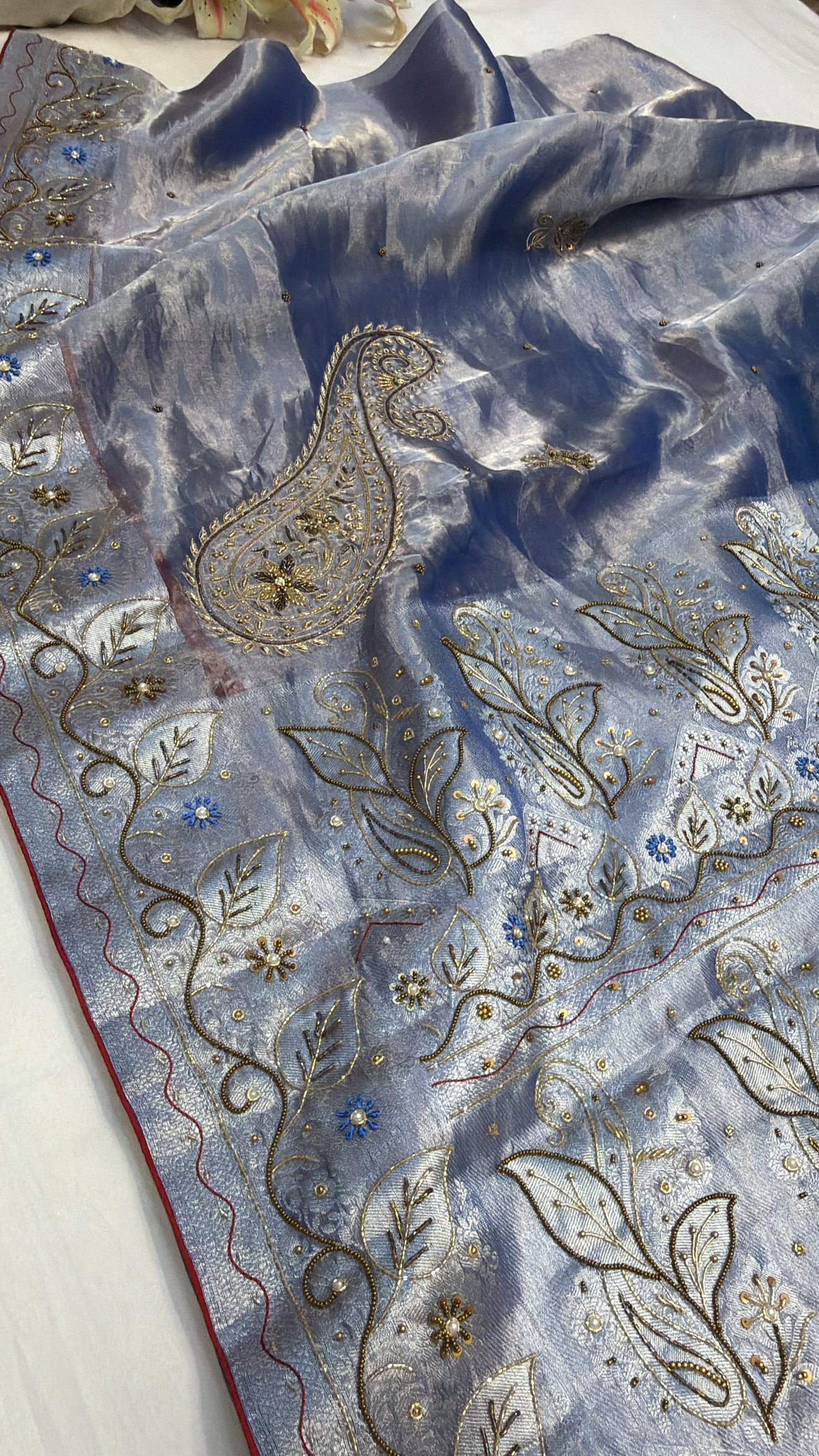 Persian blue husn tissue silk carry motif hand embroidered saree