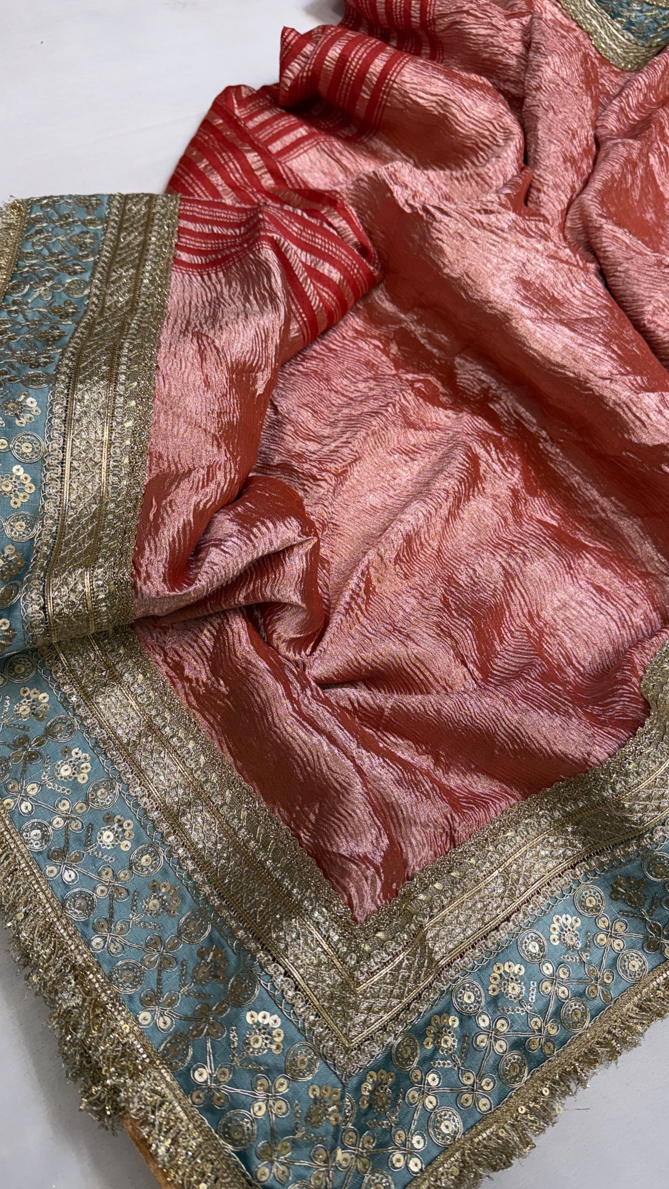 Moonga crushed tissue silk red saree