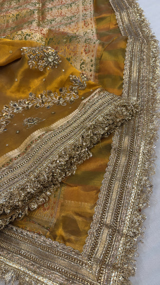 Husn mustard gold tissue silk heavy hand embroidered saree