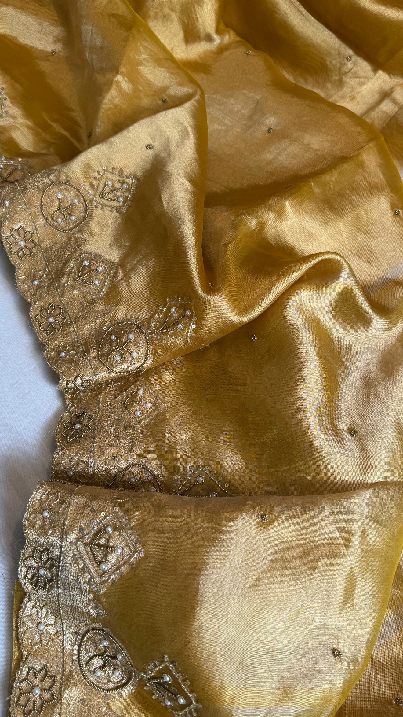 Husn golden yellow tissue silk heavy zardozi hand embroidered saree
