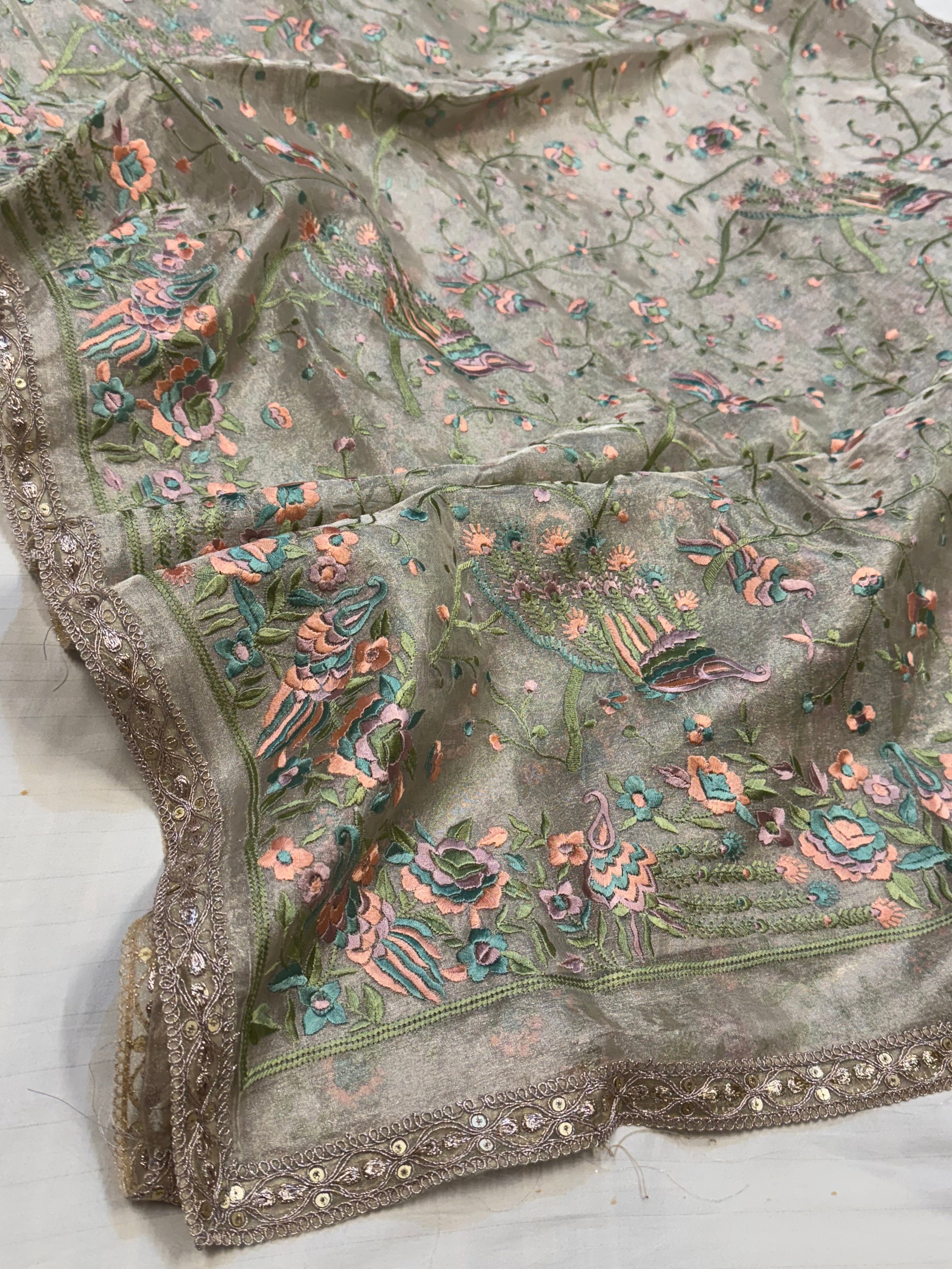 “Parsi gara” inspired tissue silk heavy resham work hand embroidered saree