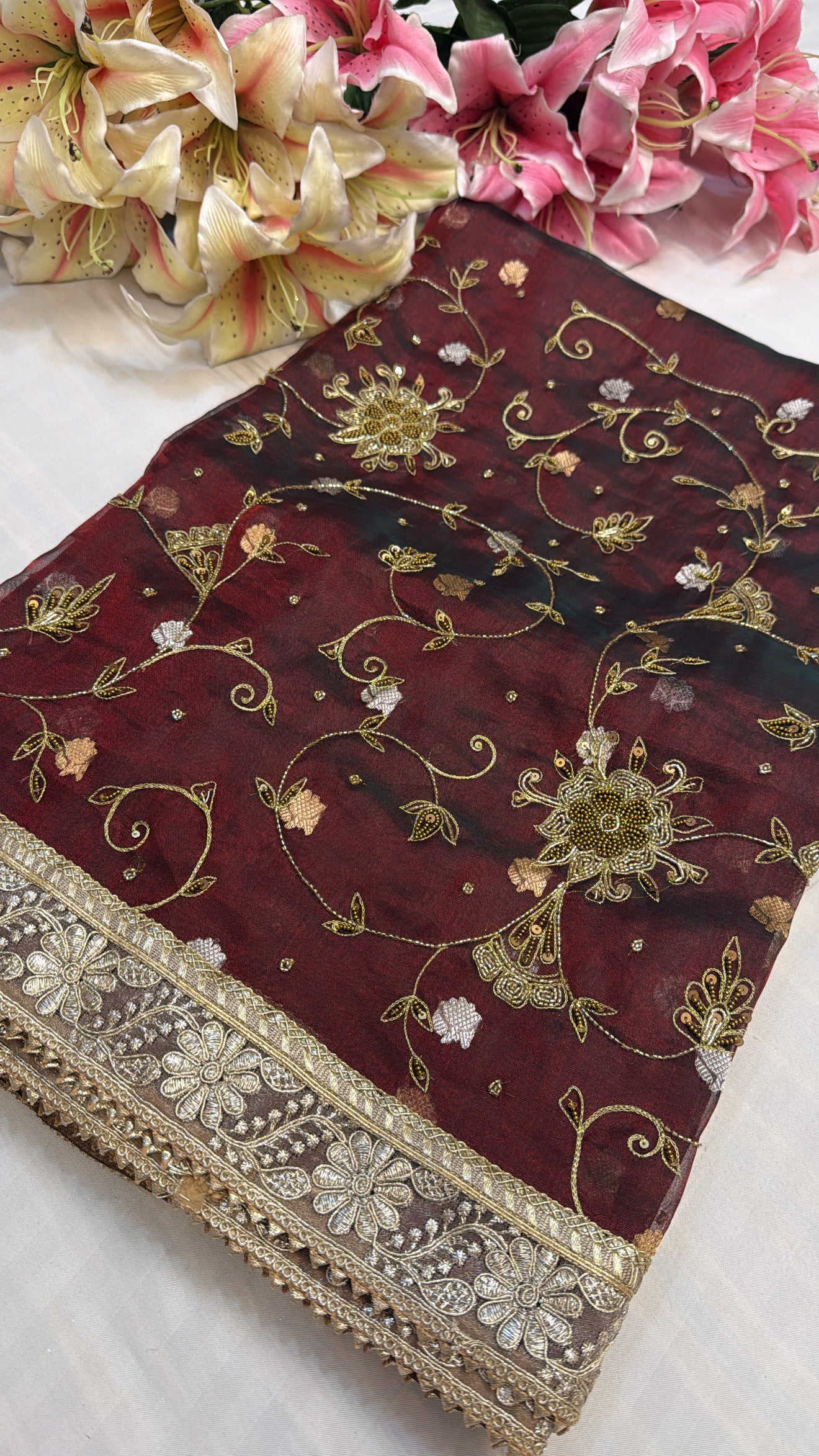Maroonish blood red tissue silk jaalwork hand embroidered kadhwa saree