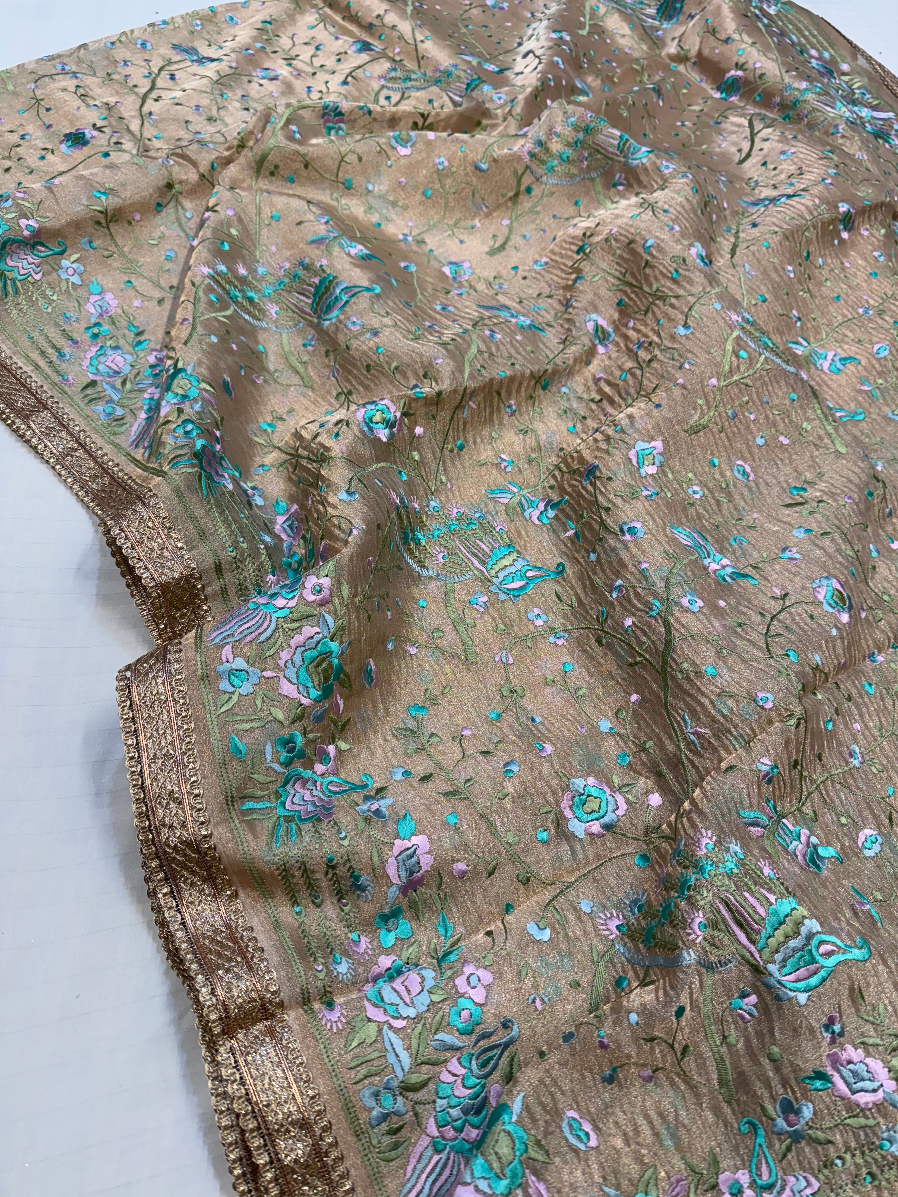“Parsi gara” inspired tissue silk heavy resham work hand embroidered saree