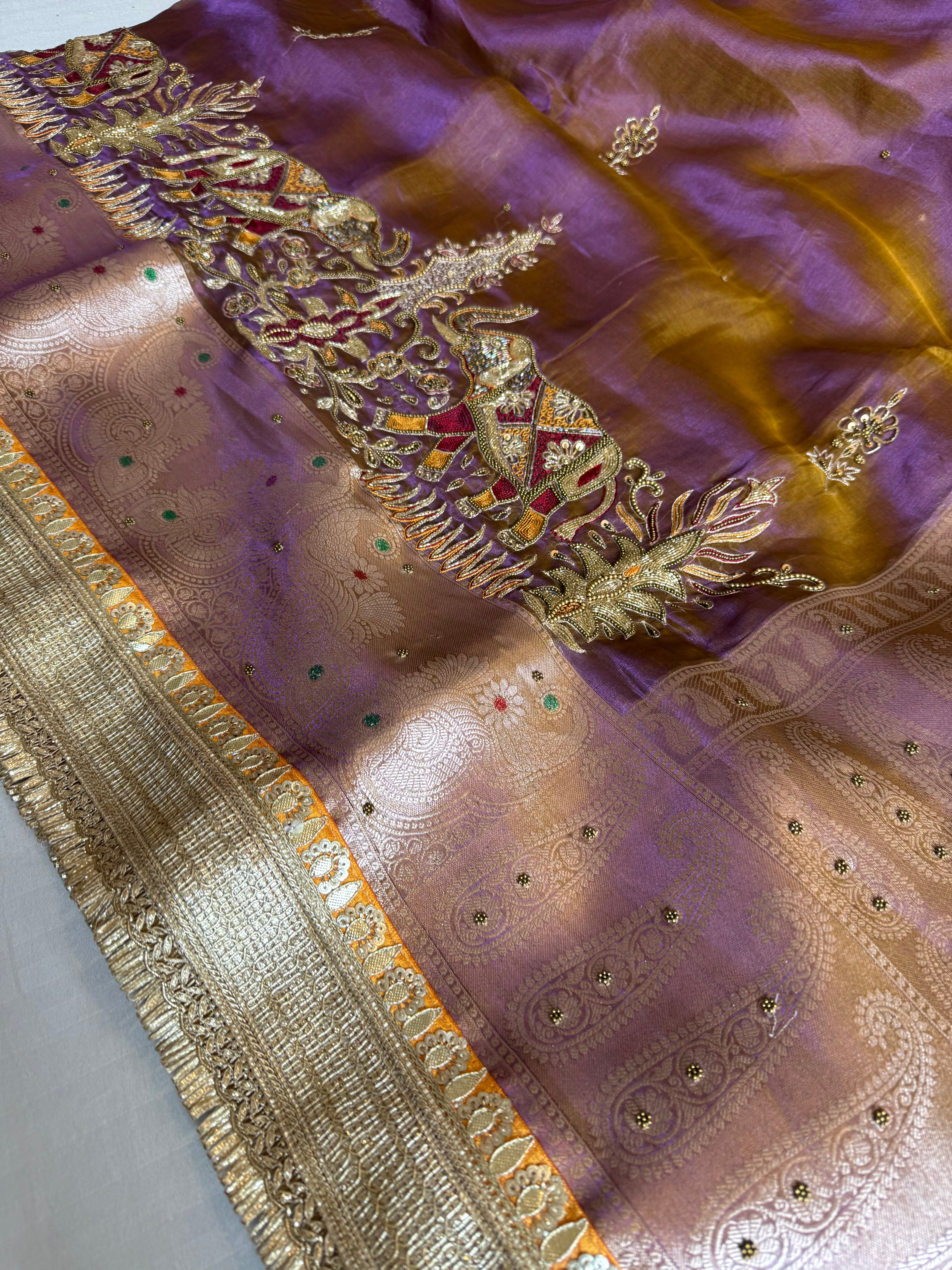 Elephant motif lavender tissue silk hand embroidered kadhwa saree
