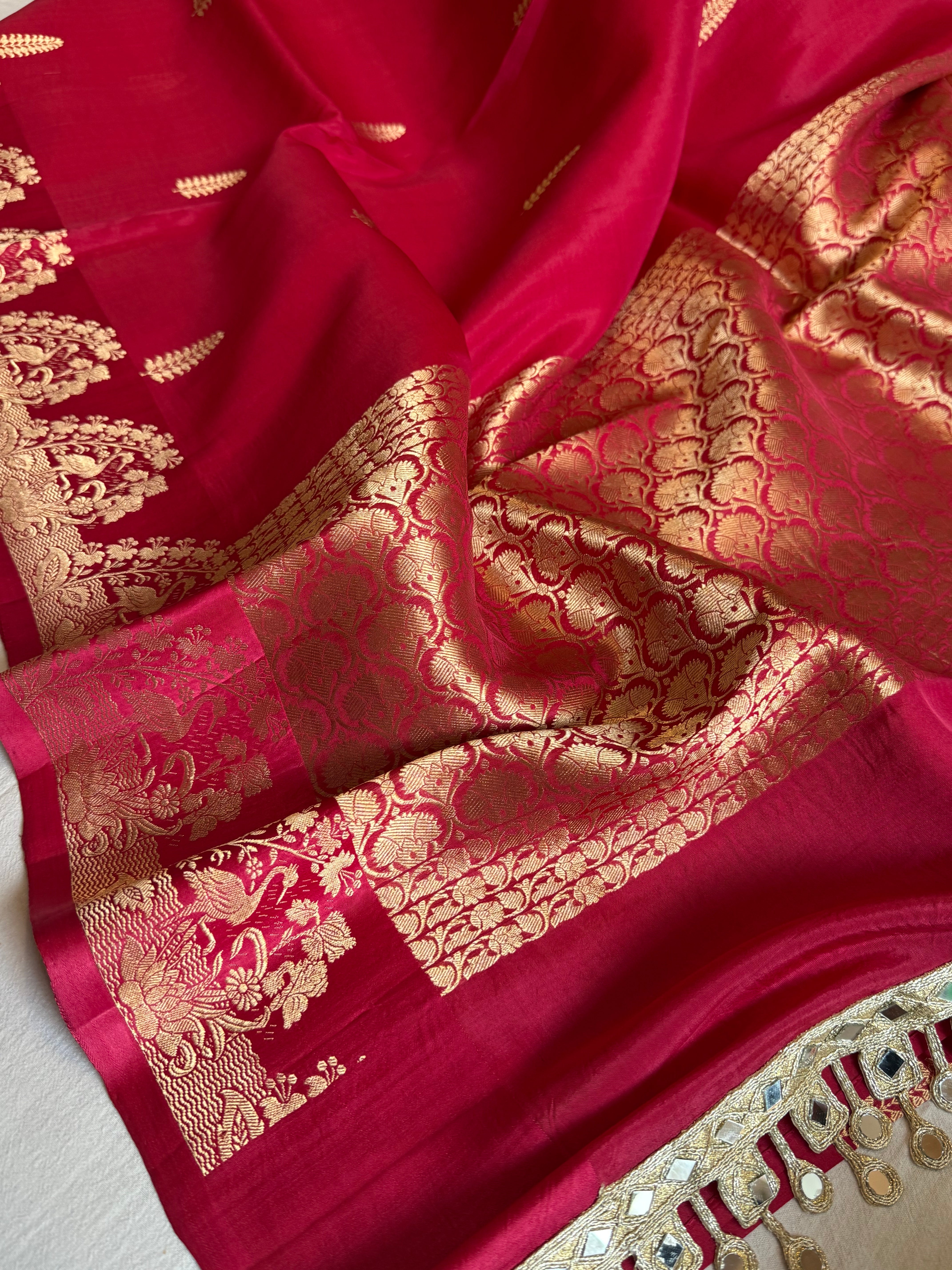 Rani pink banarasi kora silk hand embroidered kadhwa saree