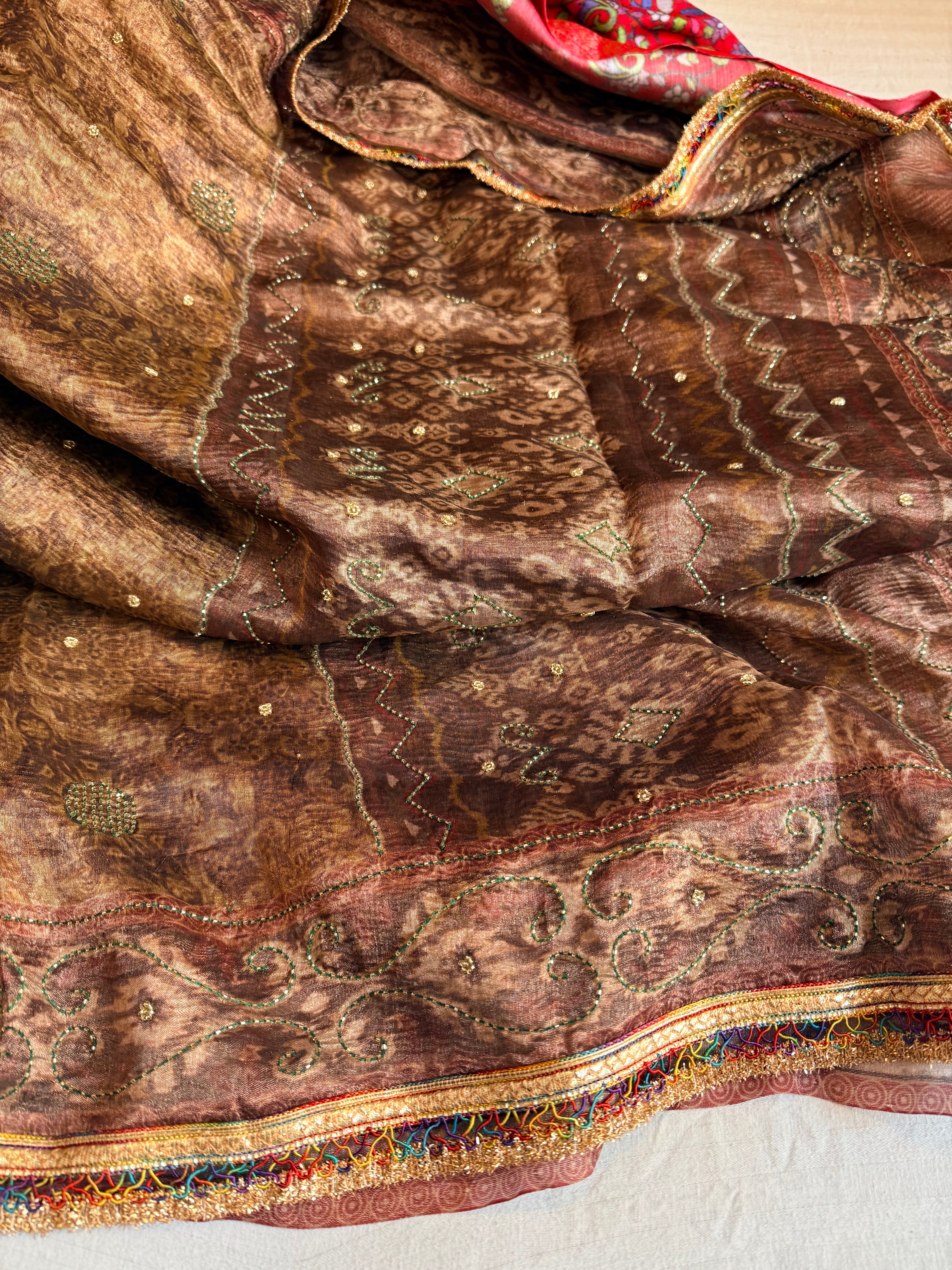 Printed tissue silk hand embroidered kadhwa gotapatti saree