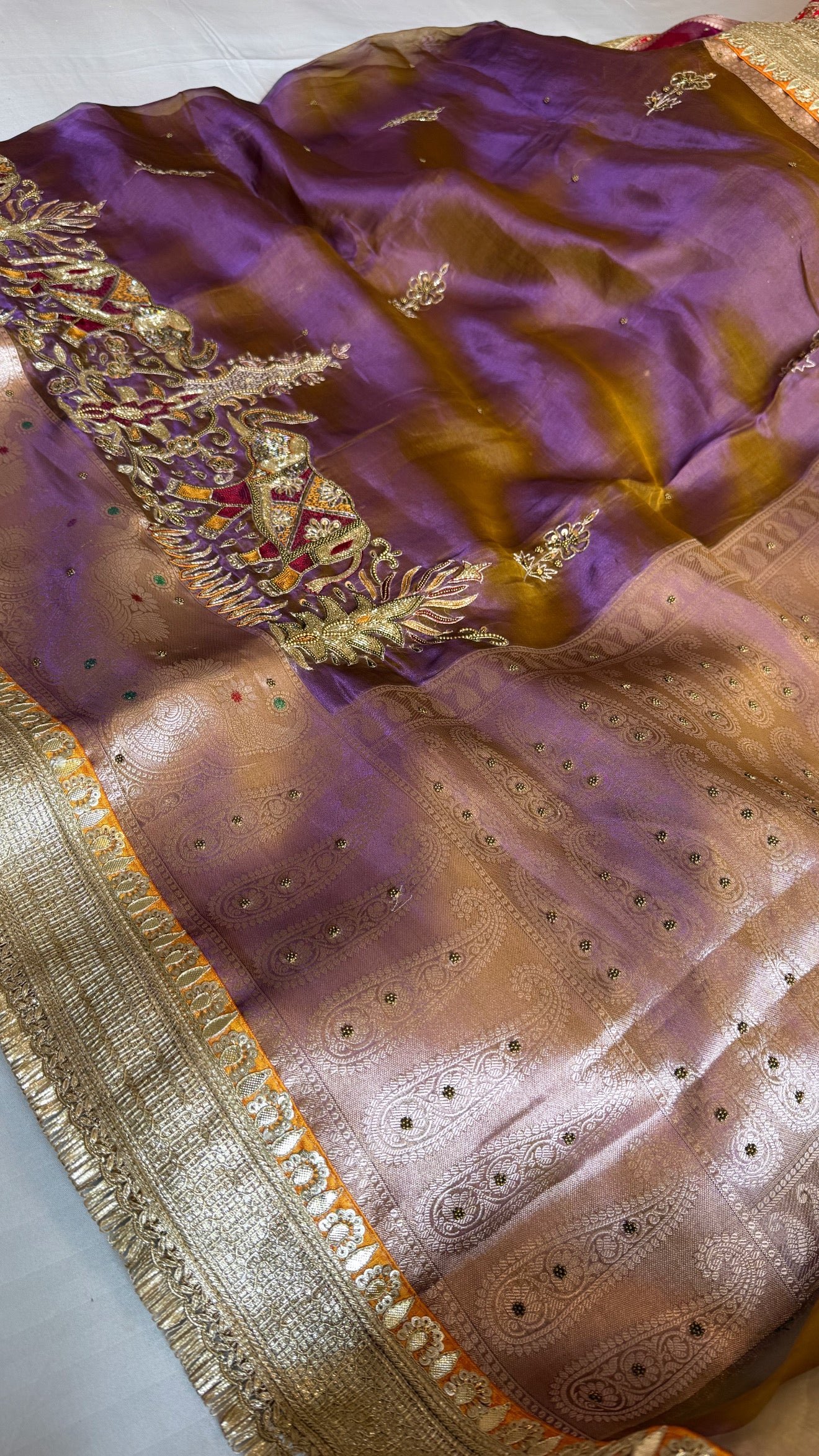 Elephant motif lavender tissue silk hand embroidered kadhwa saree