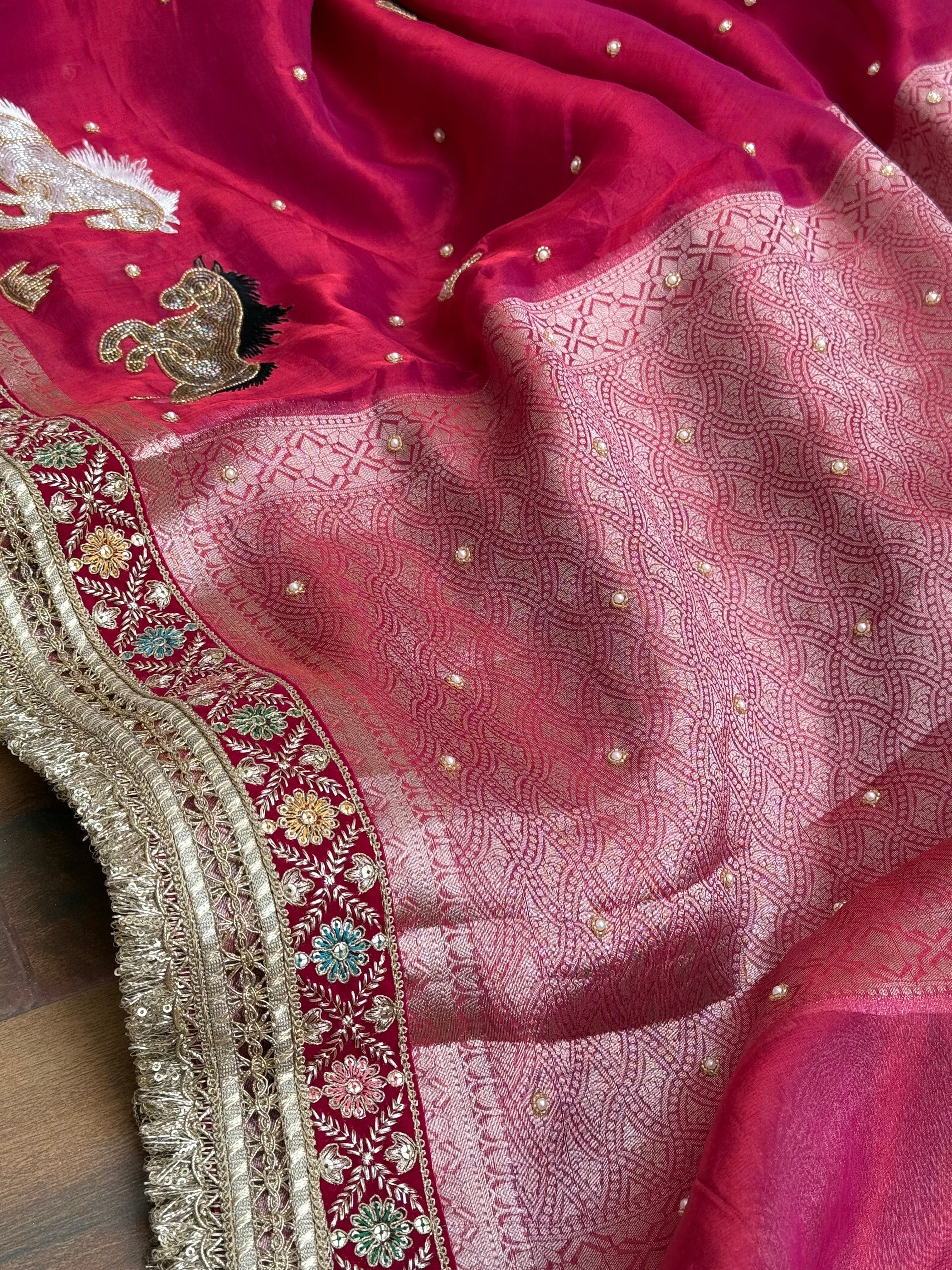 Horse hand embroidered motif cherry pinkish red dhup chao effect tissue silk banarasi gotapatti kadhwa saree