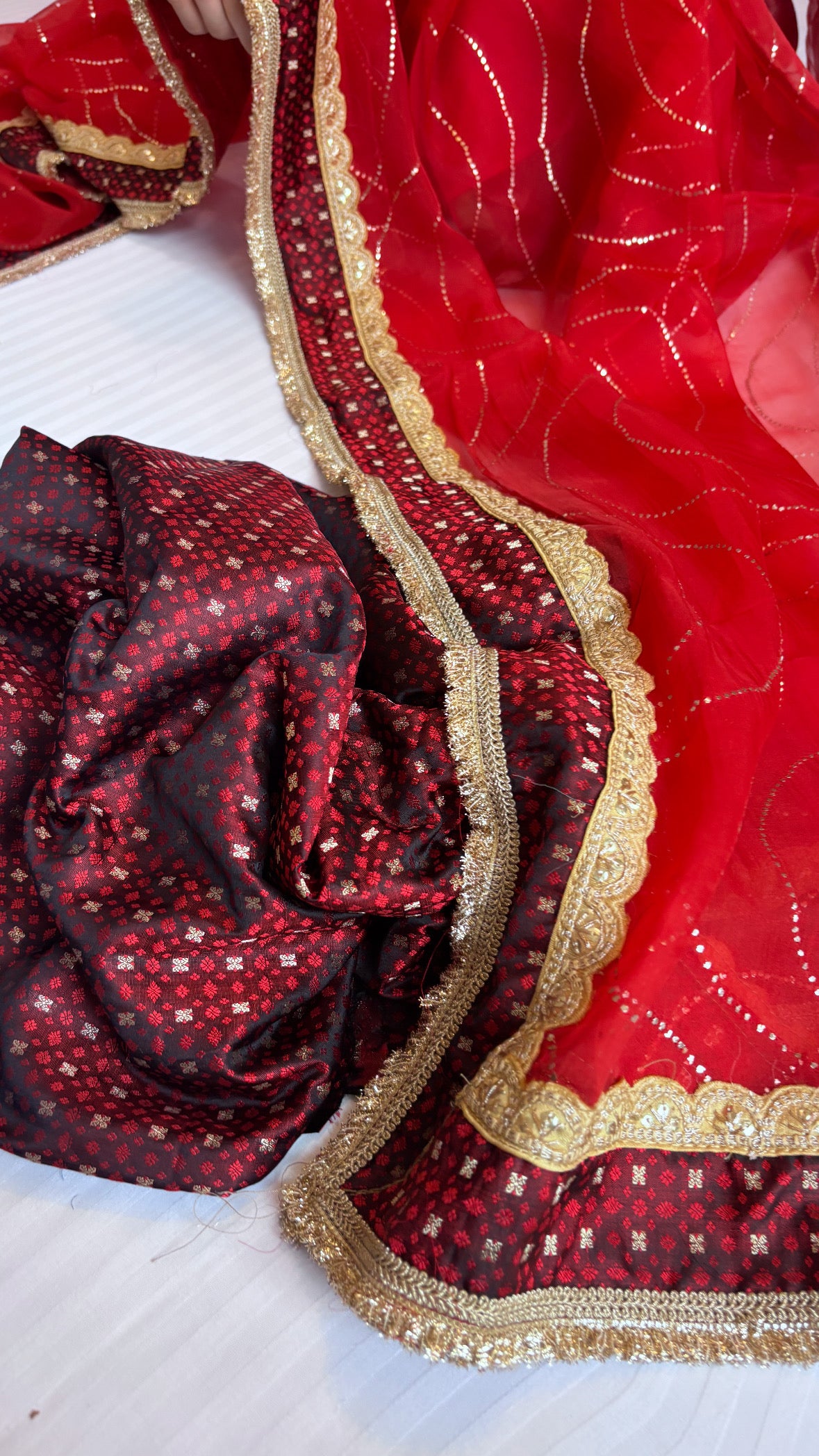 Blood maroonish red mashru tanchoi silk kurta paired with kora silk mukaish badla duppata set