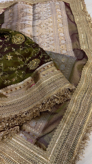 Trousseau edit — Mehendi green husn tissue silk hand embroidered saree