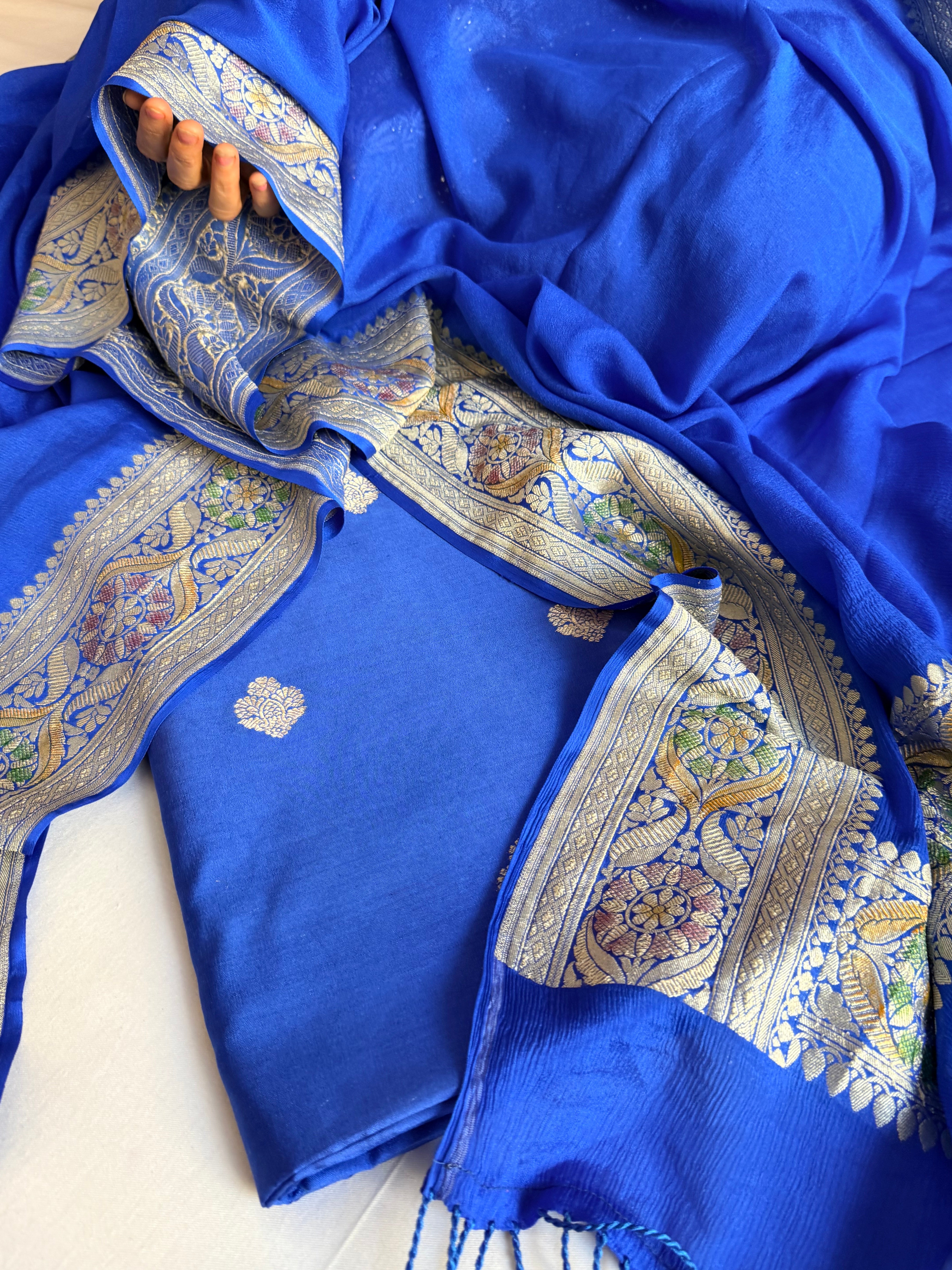 Moonga silk kadhwa kurta paired with gorgette duppata with latkans