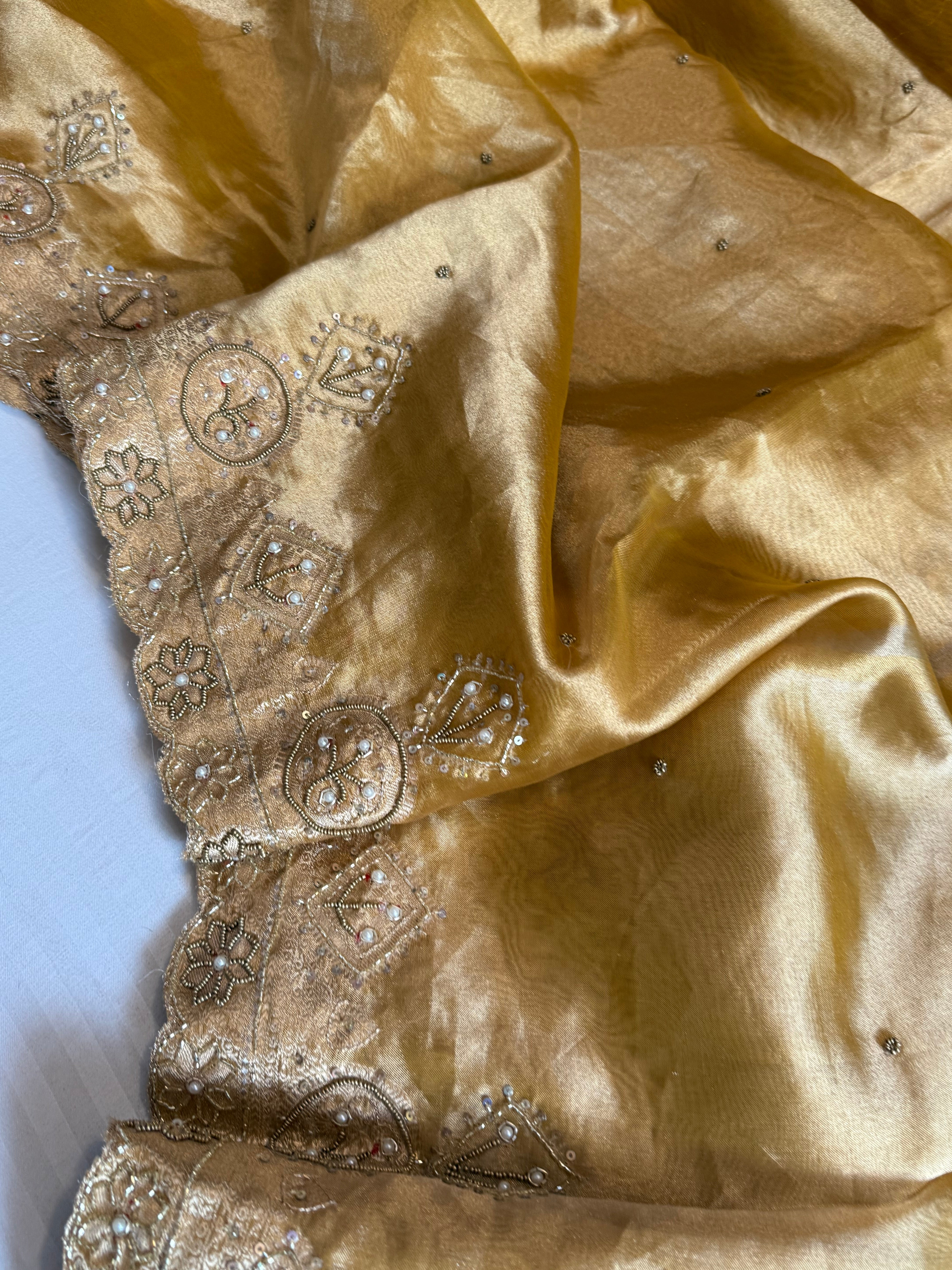 Husn golden yellow tissue silk heavy zardozi hand embroidered saree