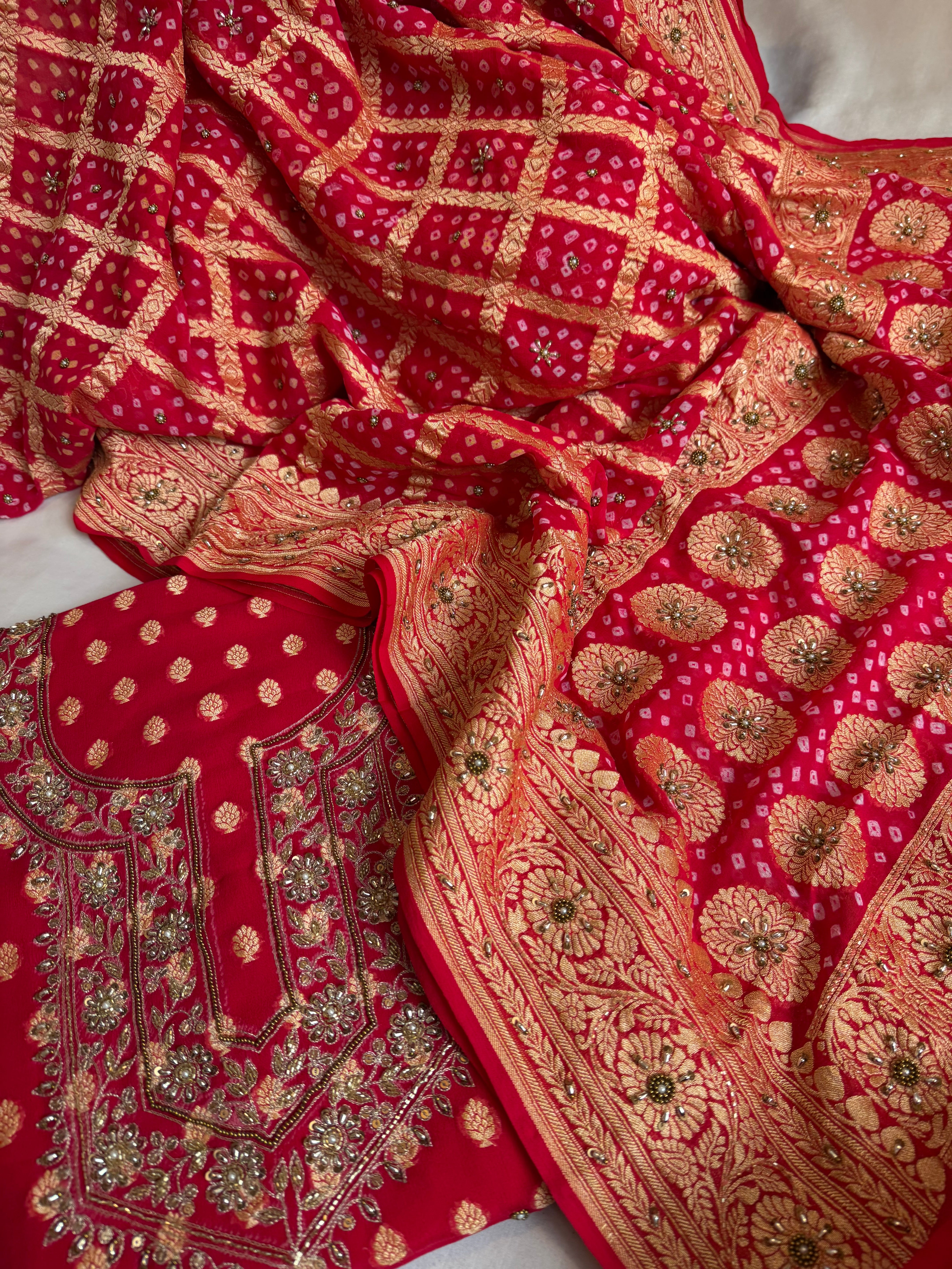 Red rai bandhej kadhwa gorgette hand embroidered suit set