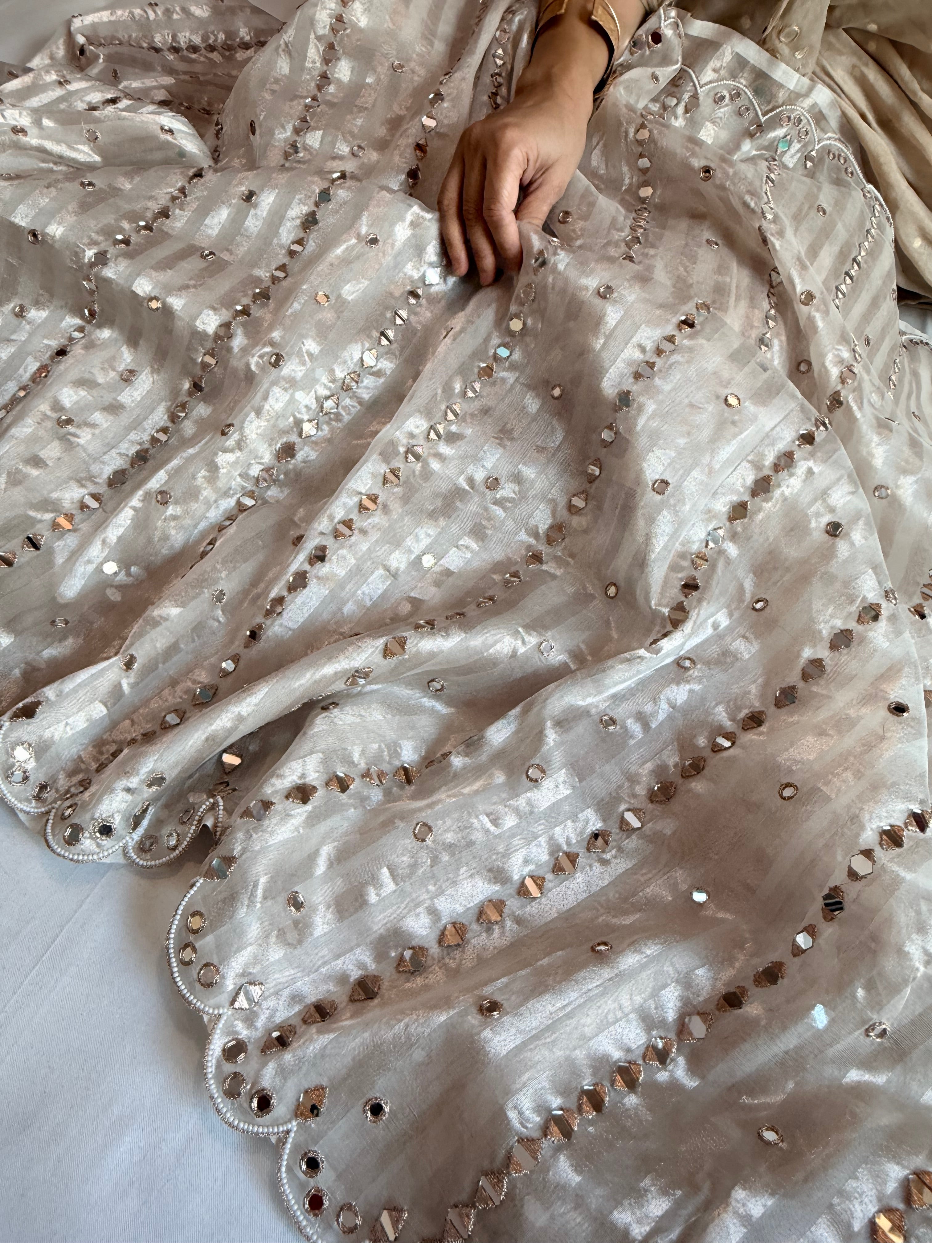 Diamond tissue silk zari stripes mirror work hand embroidered kadhwa saree