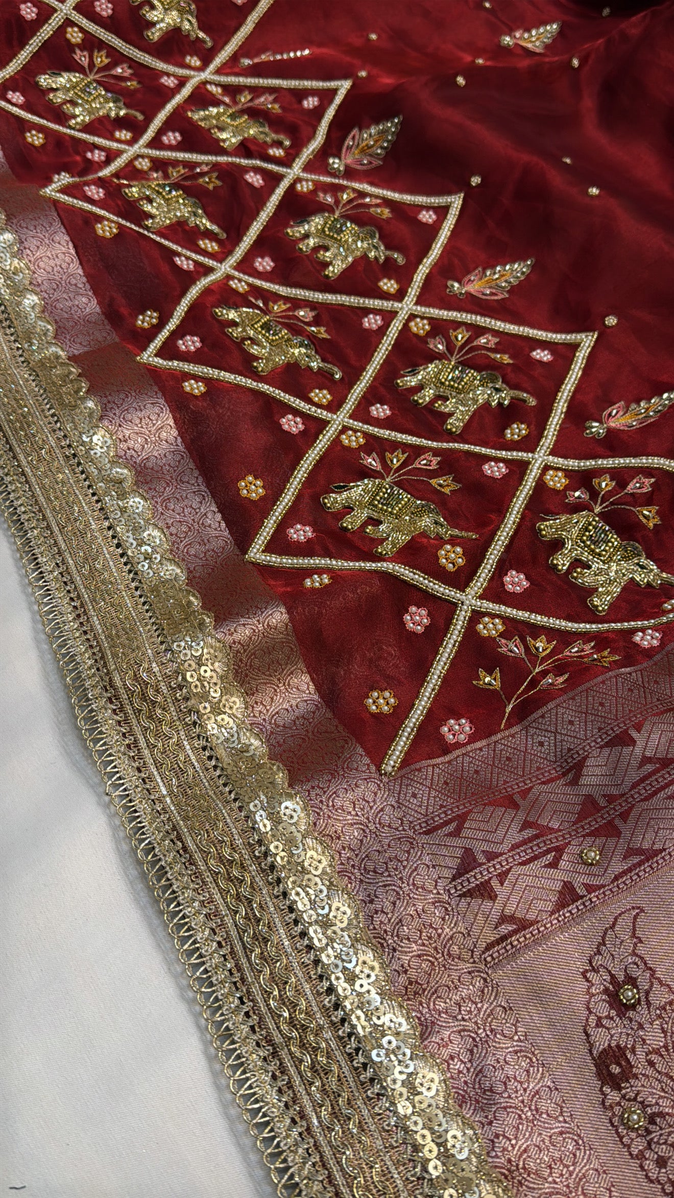Dulhan ka joda husn red tissue silk hand embroidered saree