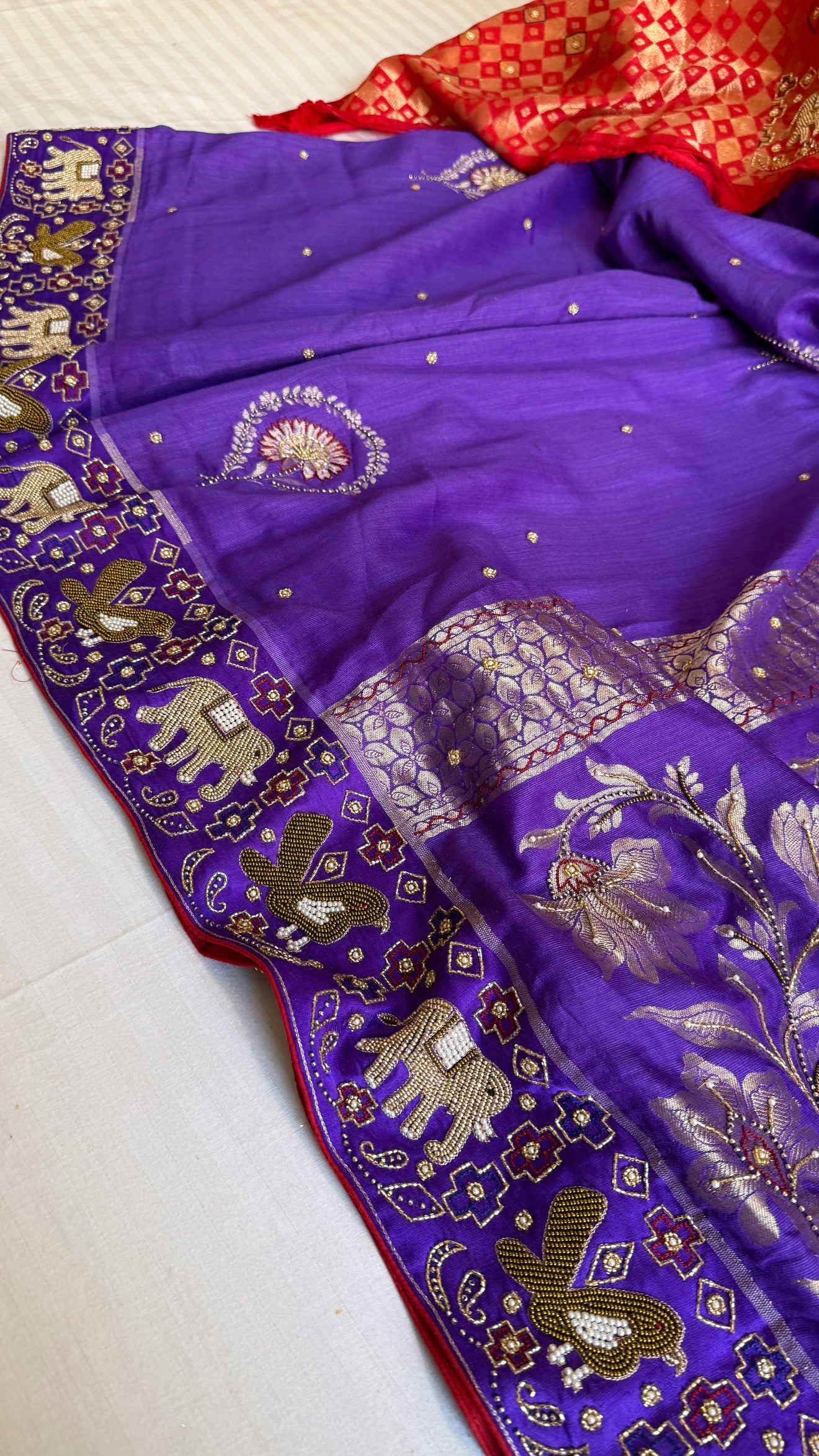 Moonga silk ikkat patola weaving inspired hand embroidered kadhwa saree
