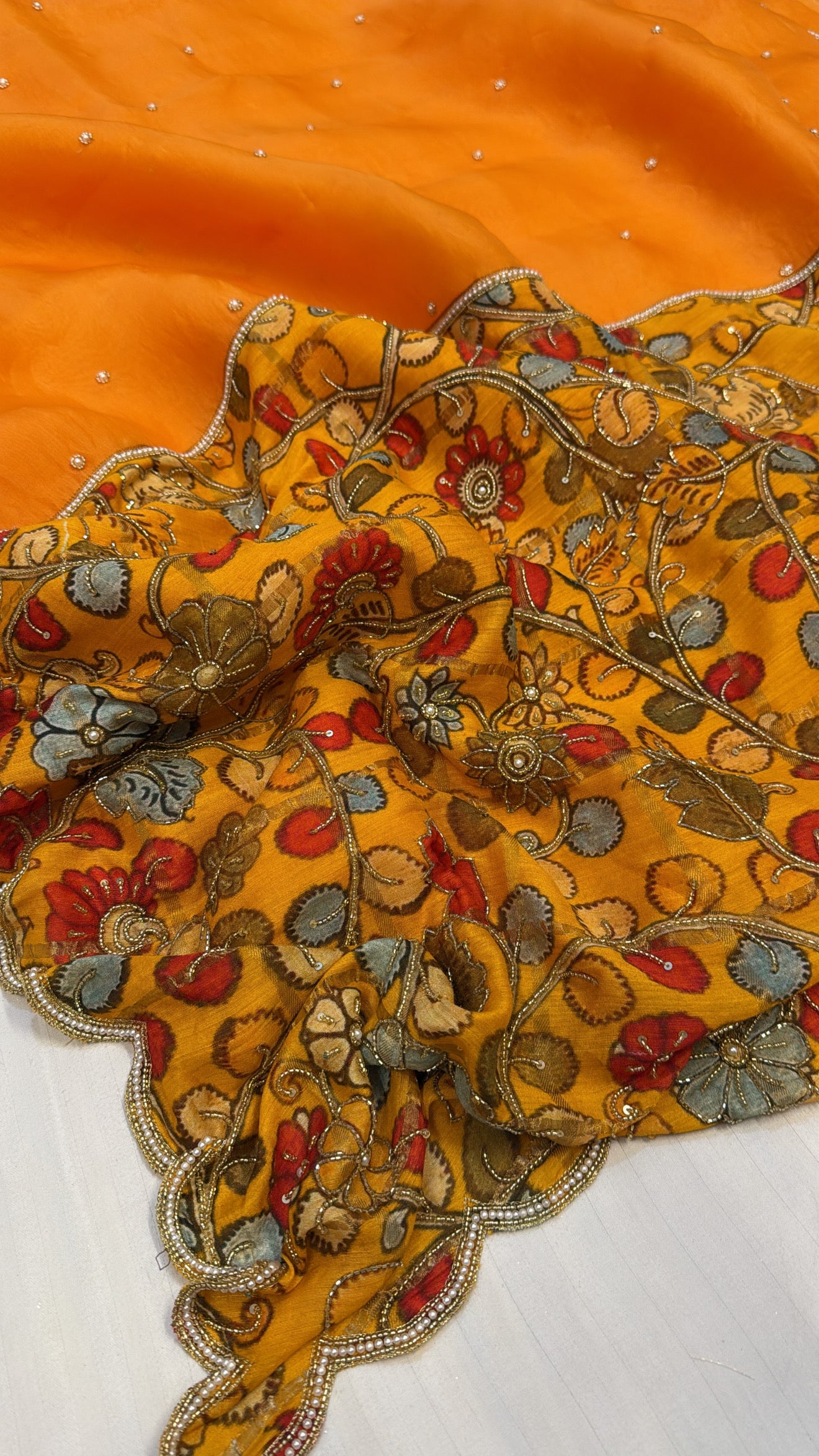 Turmeric yellow kora silk patched printed pallu kadhwa scalloped saree