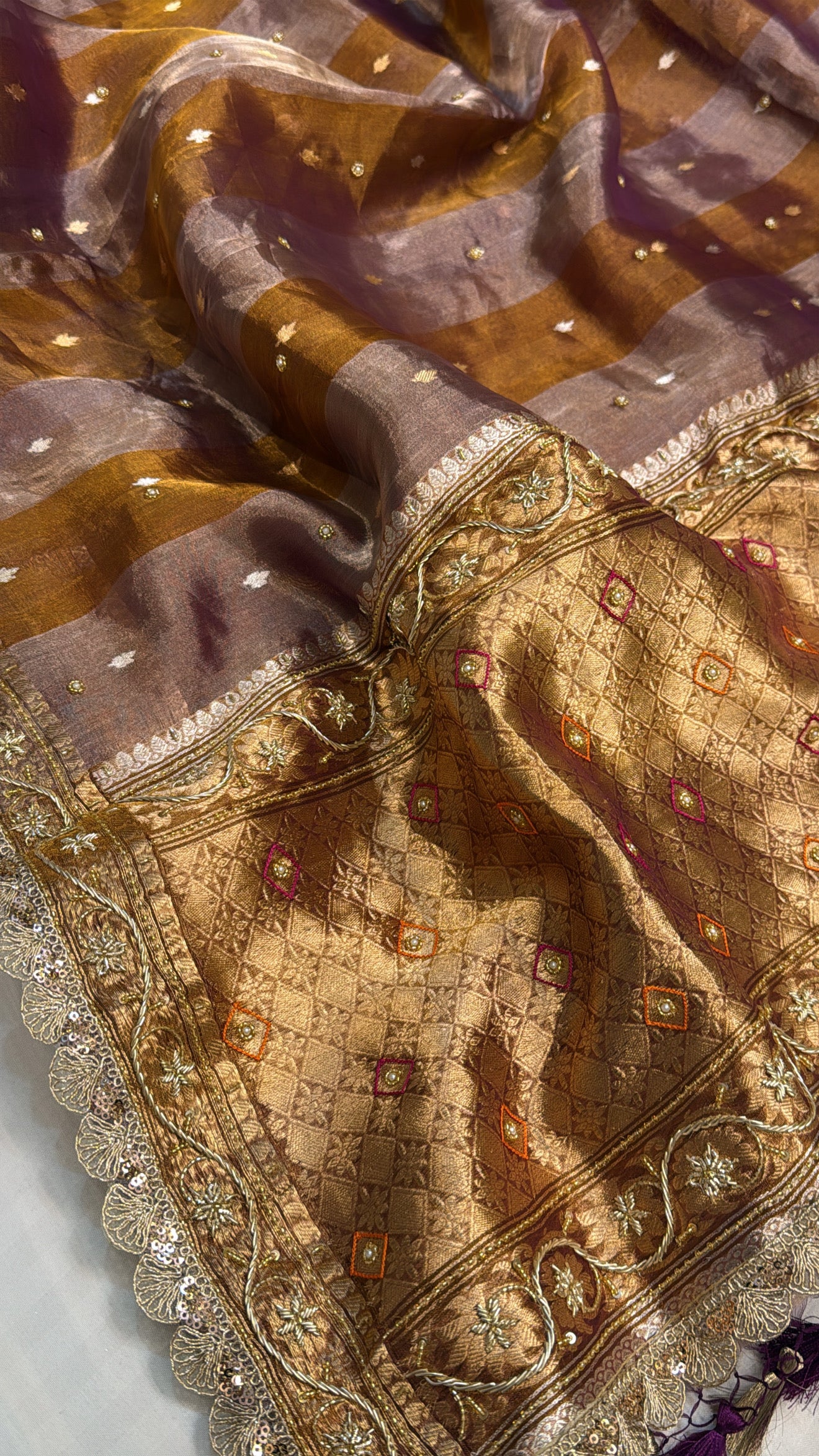 Kanjivaram peach tissue silk striped hand embroidered kadhwa saree