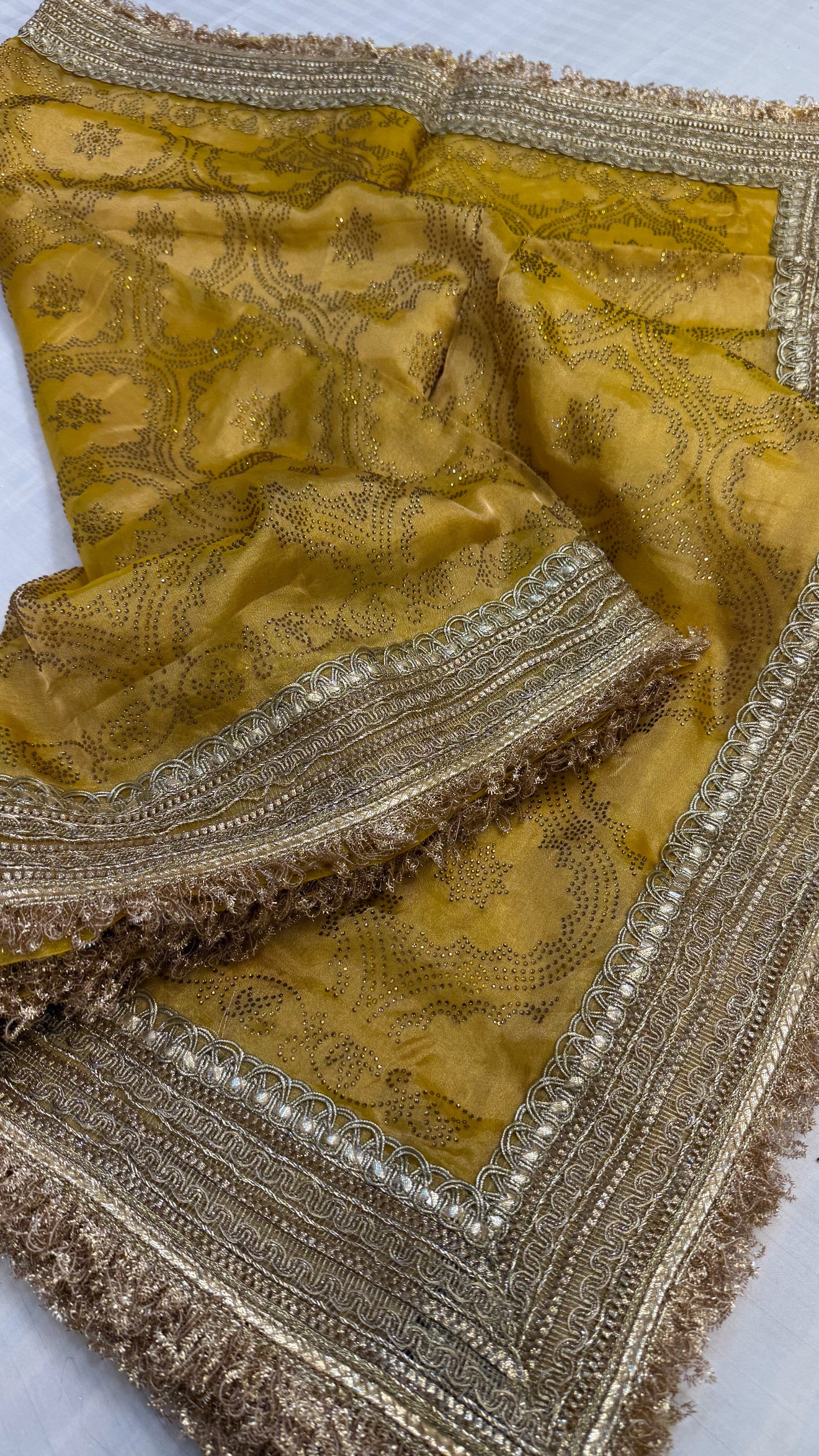 Sitara stonework haldi yellow tissue silk gotapatti saree