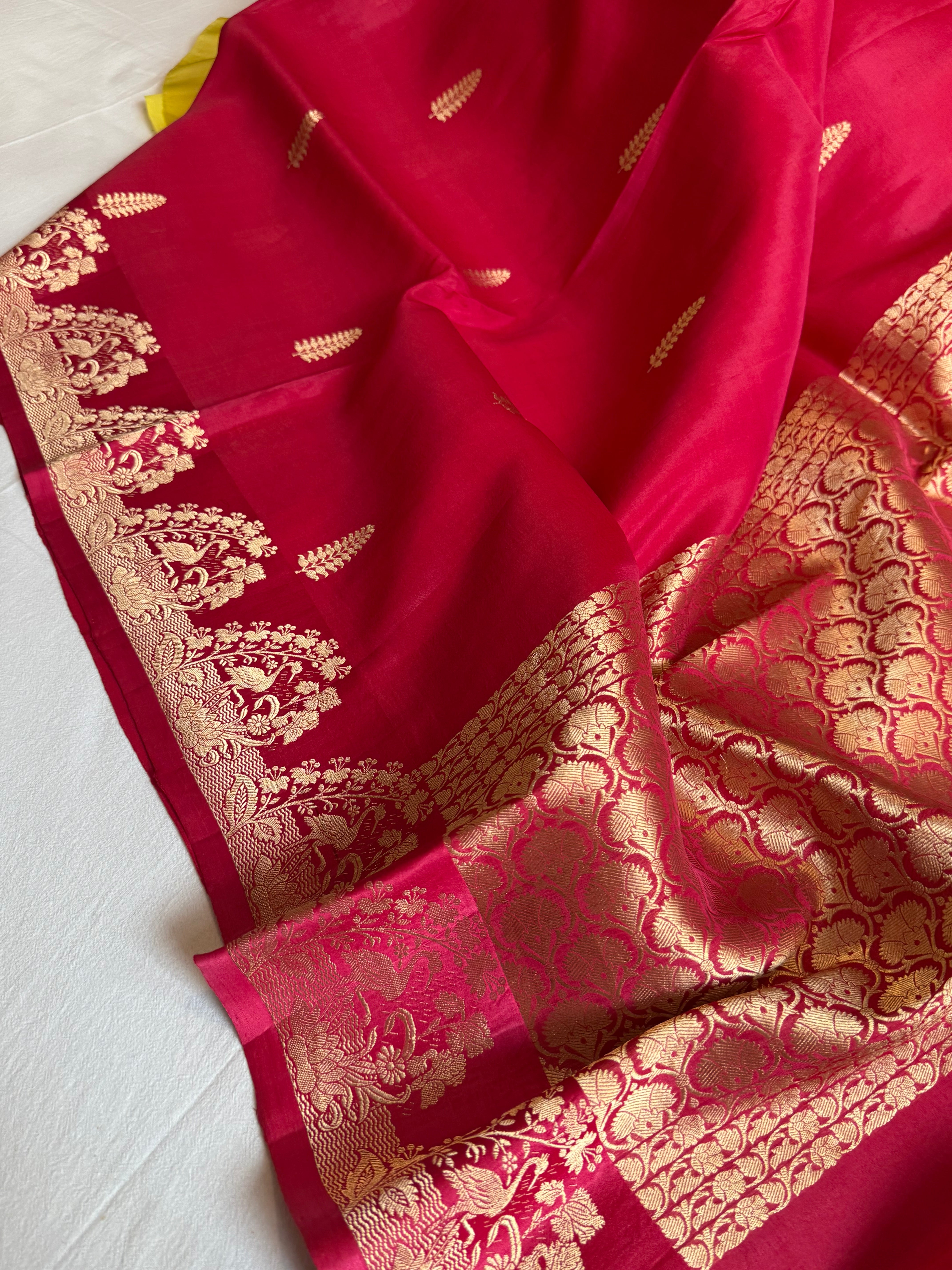 Rani pink banarasi kora silk hand embroidered kadhwa saree