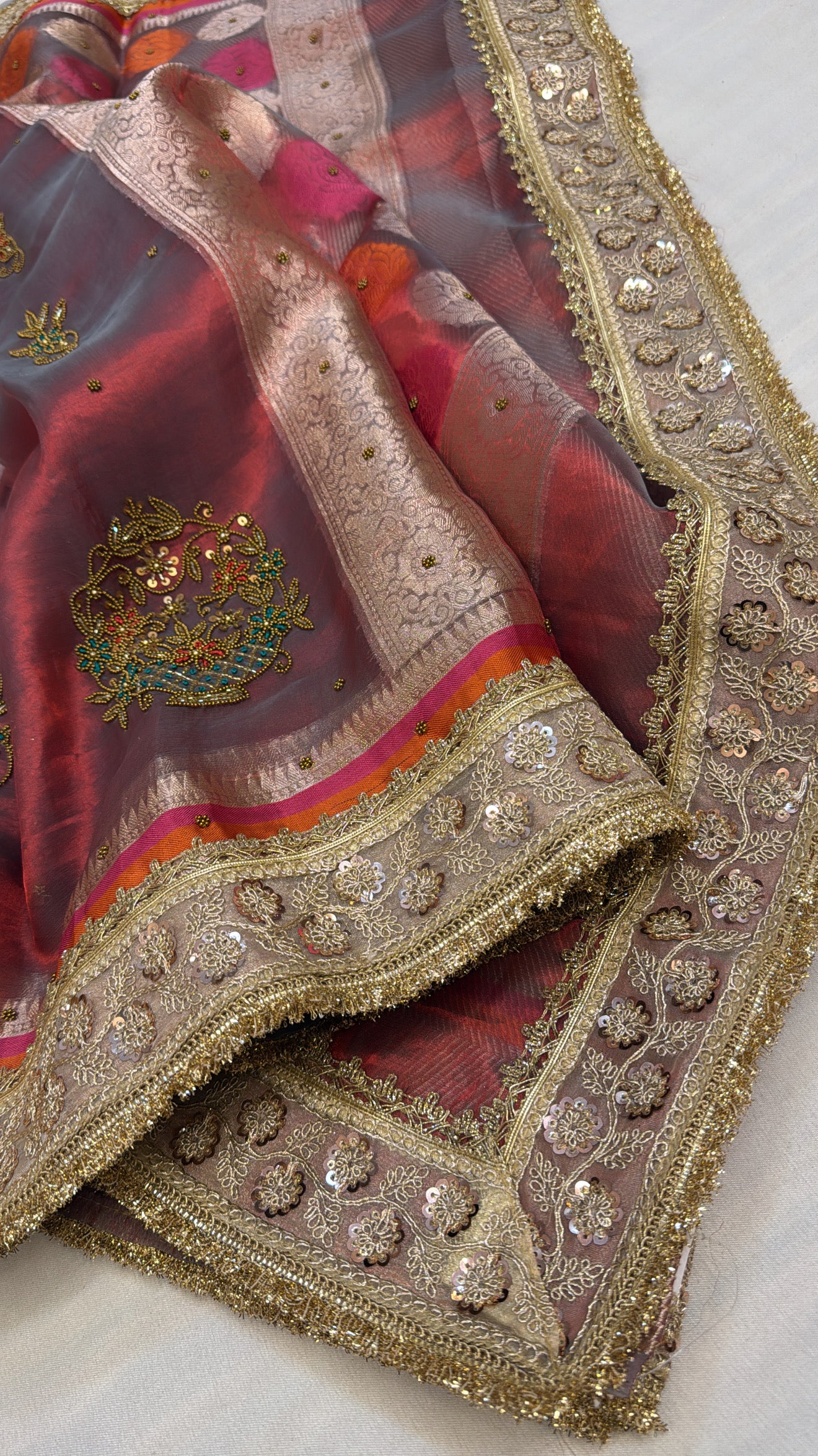 Husn dusty red antique zari hand embroidered tissue silk saree