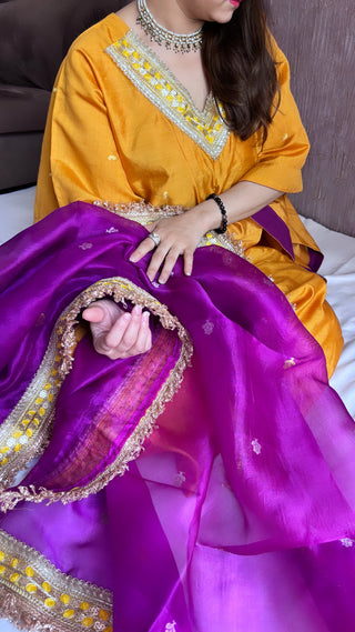 Haldi yellow-purple stitched hand embroidered kadhwa silk suit set from vyaah wala ghar edit