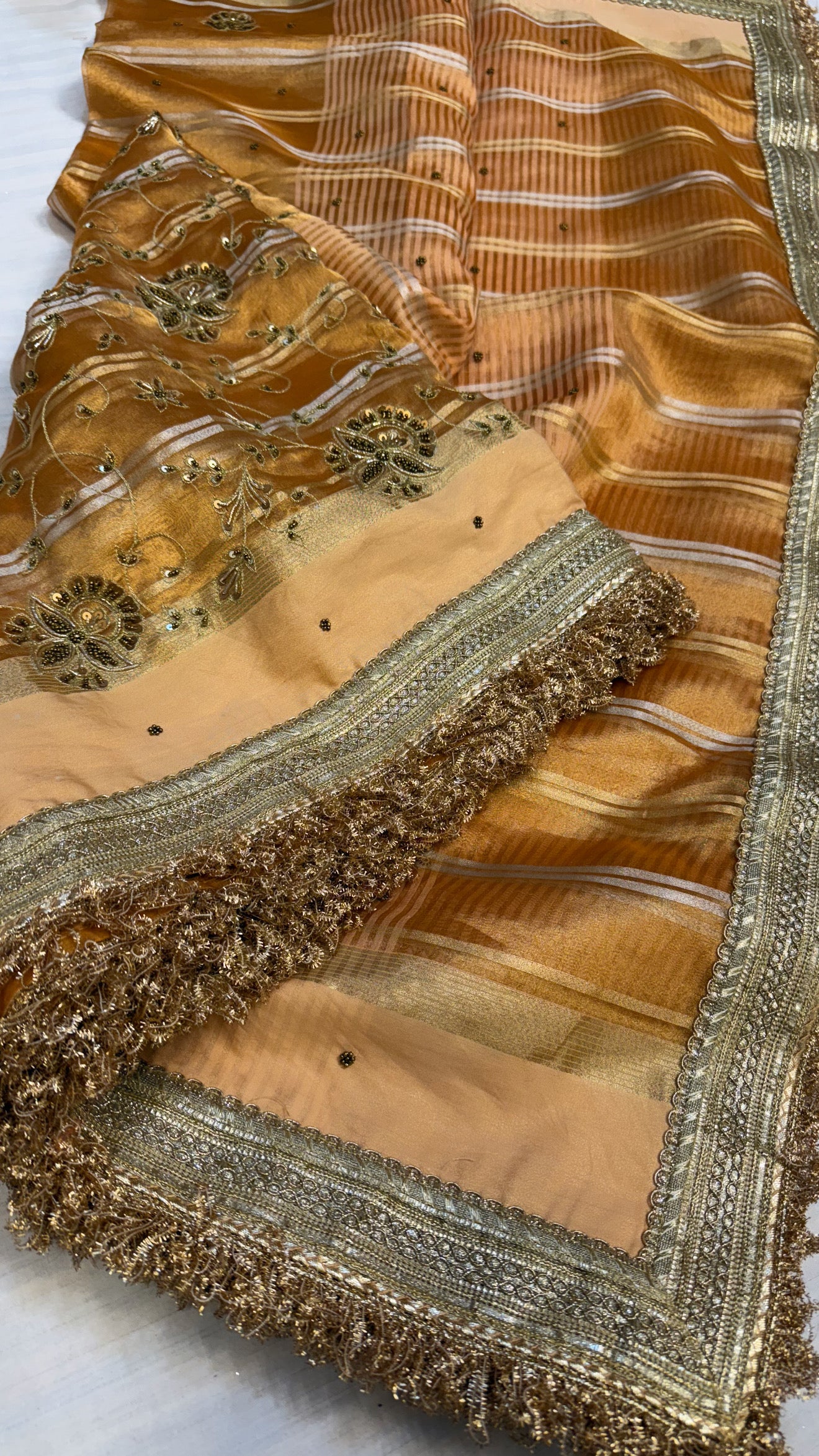 Trousseau edit — Chuski orange husn tissue silk hand embroidered saree