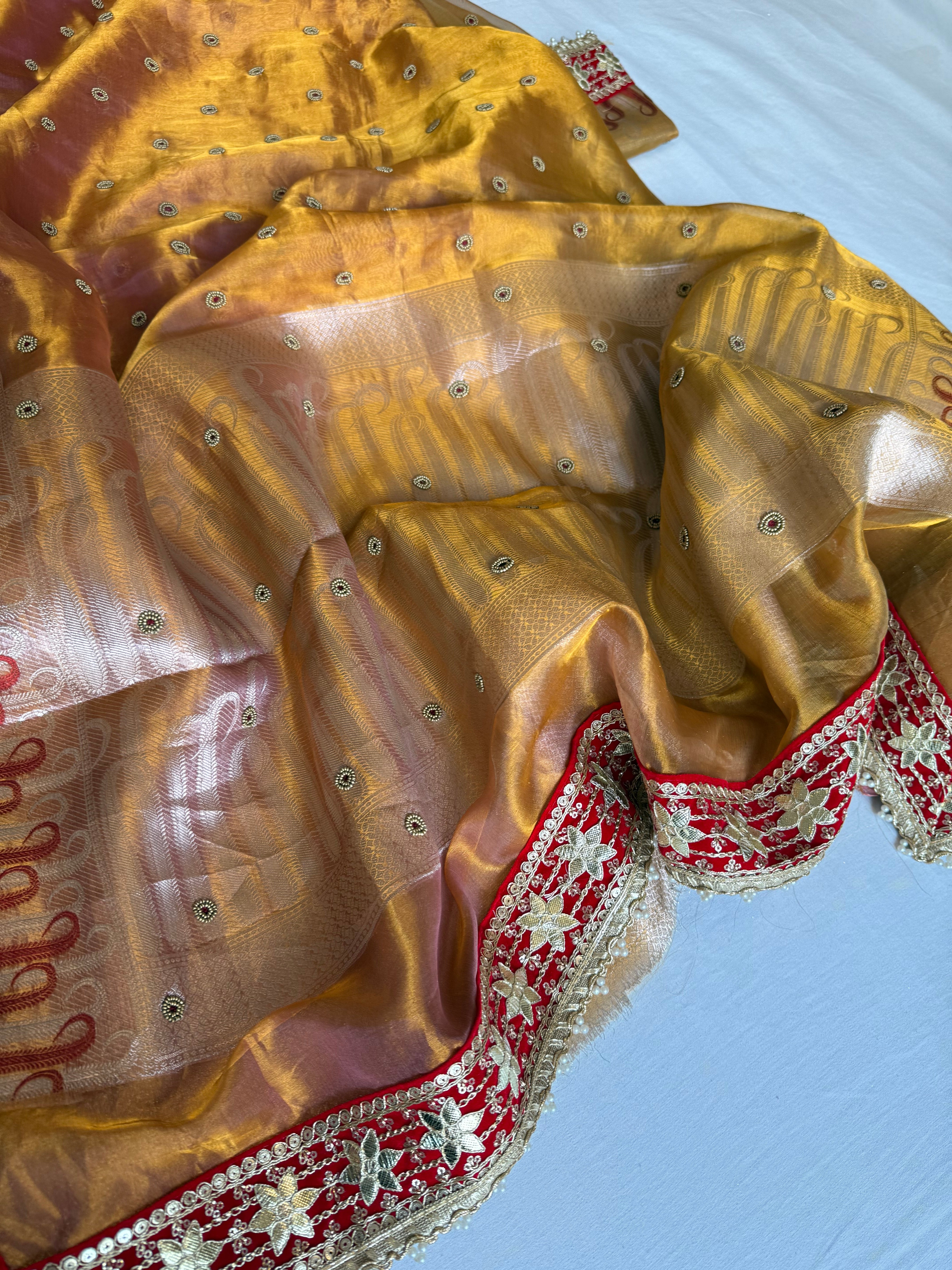 Kanjivaram gold tissue silk red meenakari hand embroidered kadhwa saree